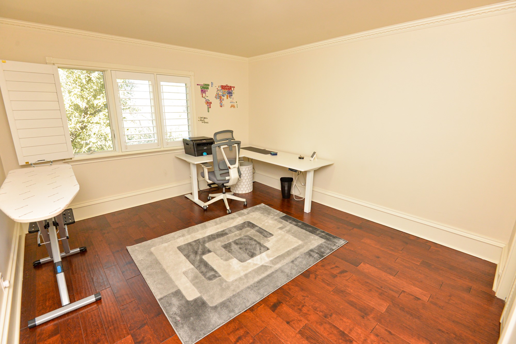 10710 D-K Ranch Road Austin, TX 78759 - Photo 23 of 34 Rich hardwood flooring and crown molding define this versatile office space.