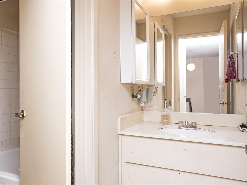 149 El Dorado Common Fremont, CA 94539 - Photo 11 of 12 a bathroom with a sink and a mirror