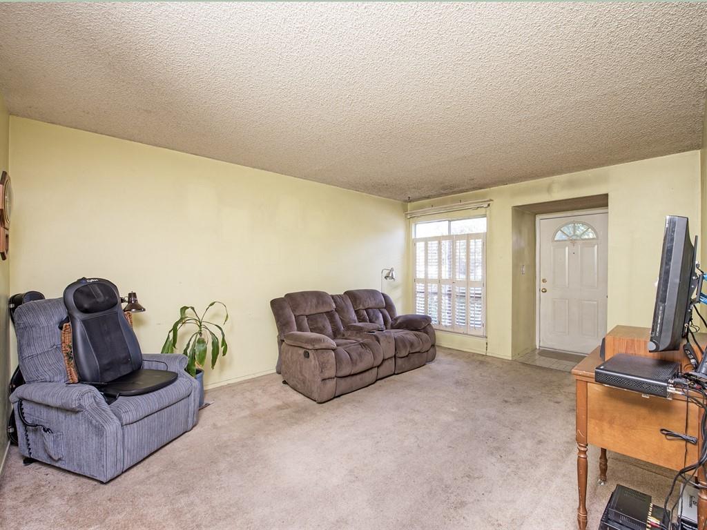 149 El Dorado Common Fremont, CA 94539 - Photo 3 of 12 a living room with furniture and a flat screen tv