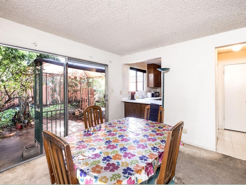 149 El Dorado Common Fremont, CA 94539 - Photo 5 of 12 a view of a dining room with furniture window and outside view