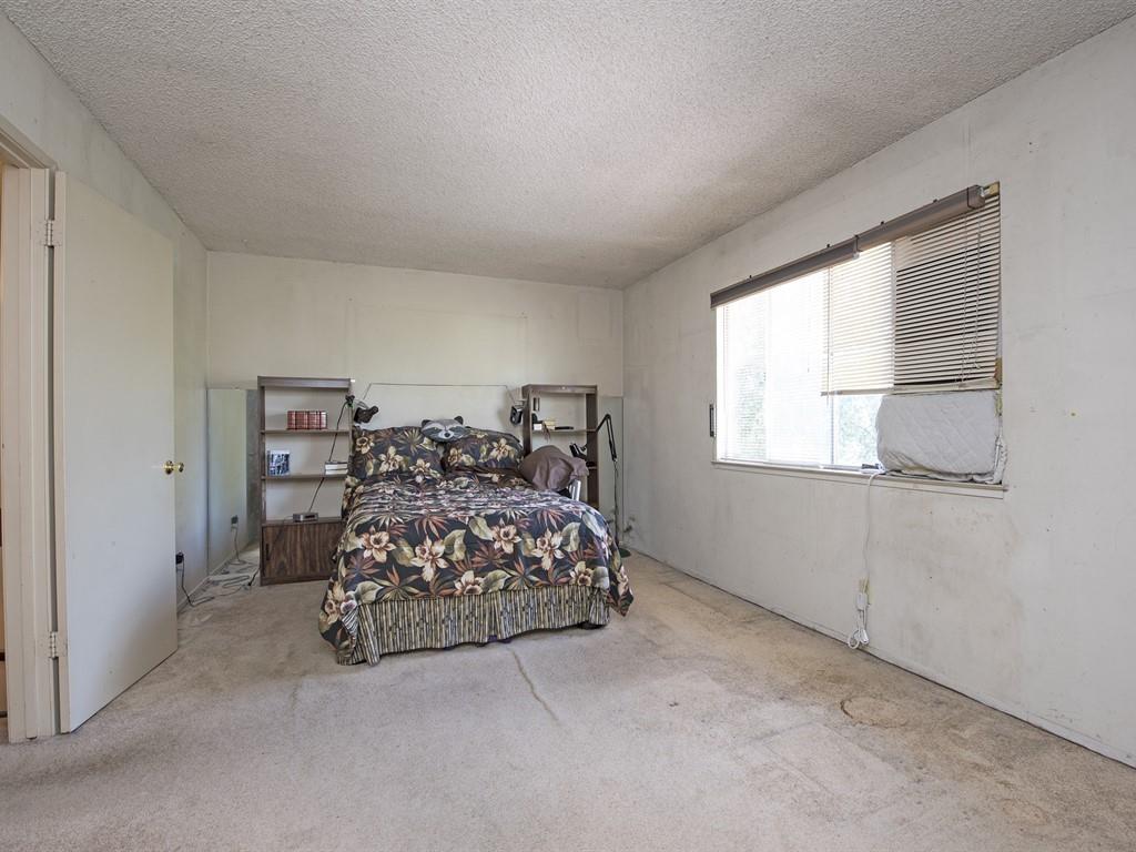 149 El Dorado Common Fremont, CA 94539 - Photo 8 of 12 a bed sitting in a bedroom next to a window