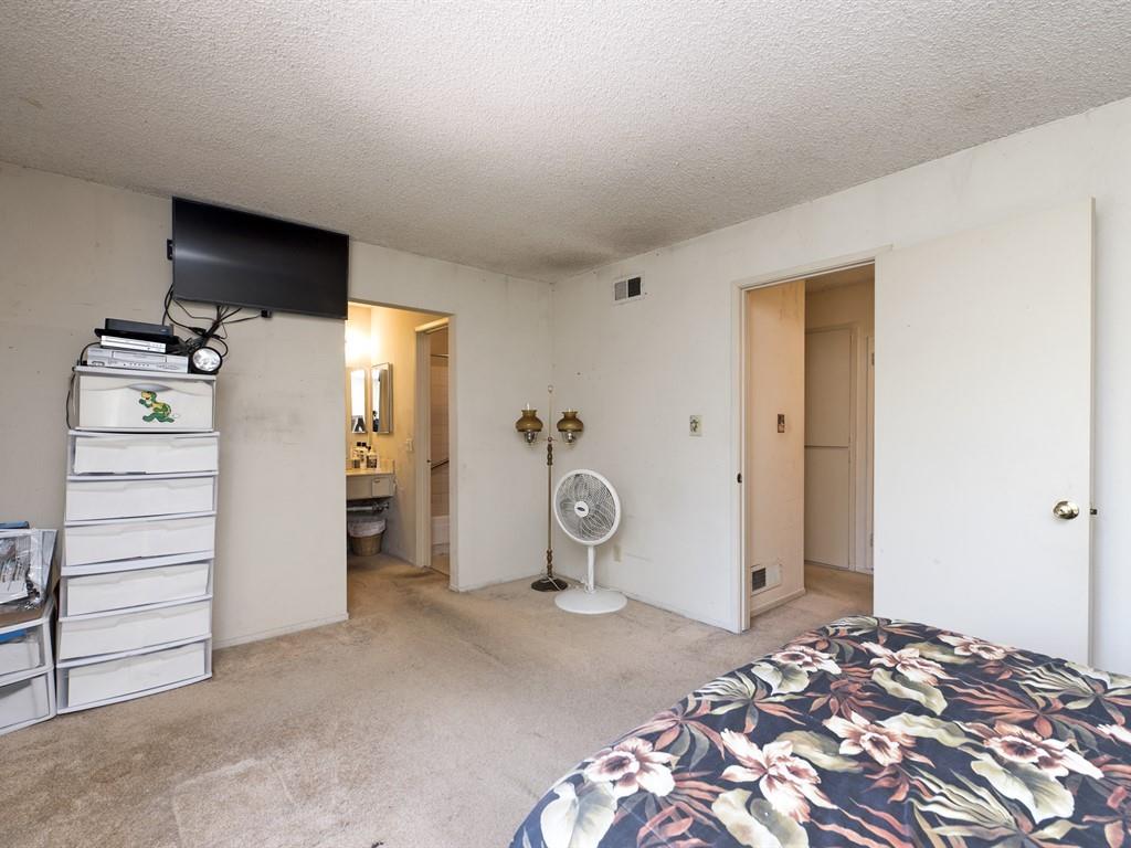 149 El Dorado Common Fremont, CA 94539 - Photo 9 of 12 a bedroom with a bed and a cabinet