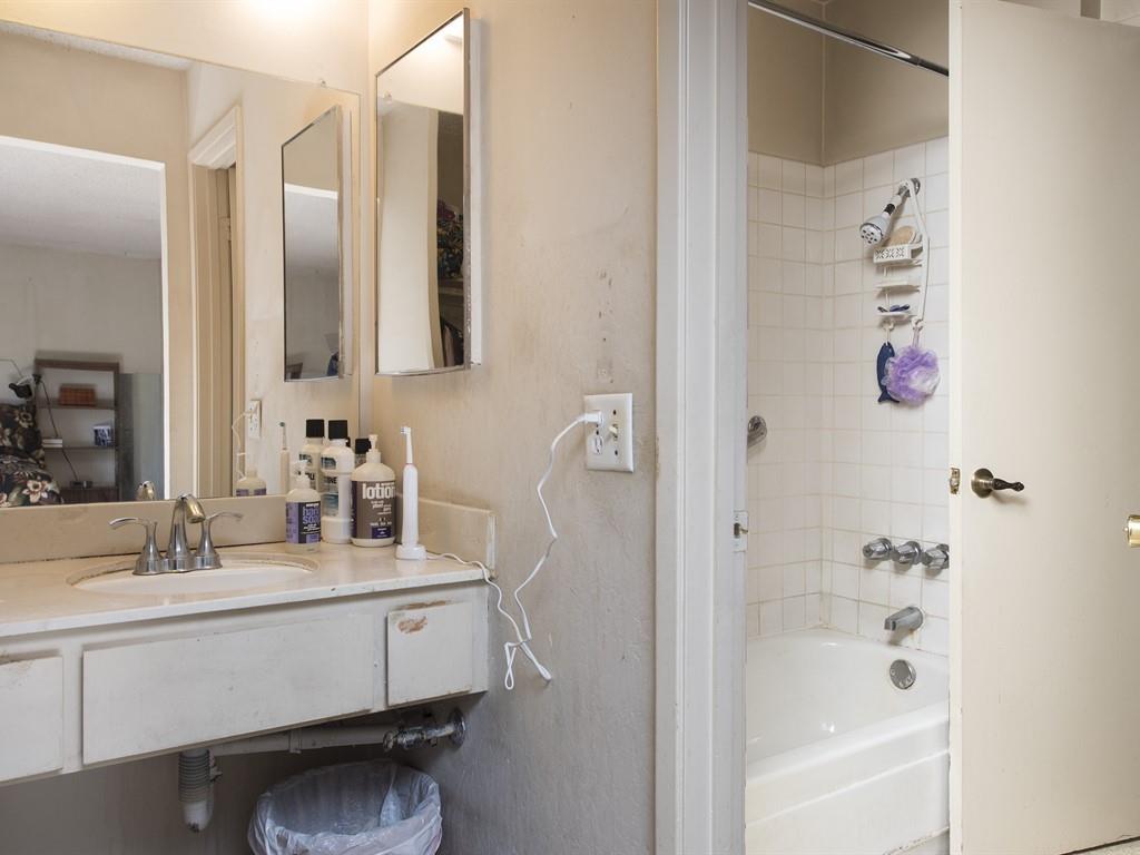 149 El Dorado Common Fremont, CA 94539 - Photo 10 of 12 a bathroom with a shower sink and mirror
