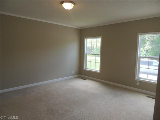 4603 Roundleaf Road Ramseur, NC 27316 - Photo 9 of 16 Master Bedroom.