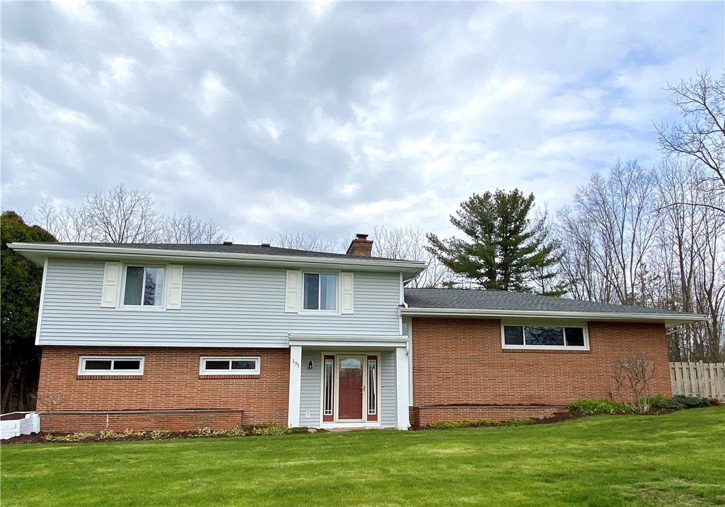 191 West Bloomfield Road Pittsford, NY 14534 - Photo 1 of 1 Front of house with new vinyl sidings, roof, and t