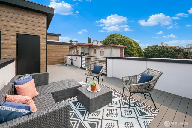 a view of a terrace with furniture and a potted plant