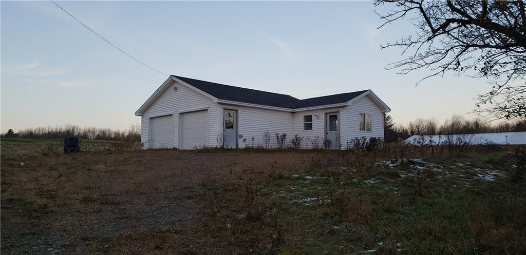 71 Garland Road Charleston, ME 04422 - Photo 28 of 30 Garage with pad site for a trailer...