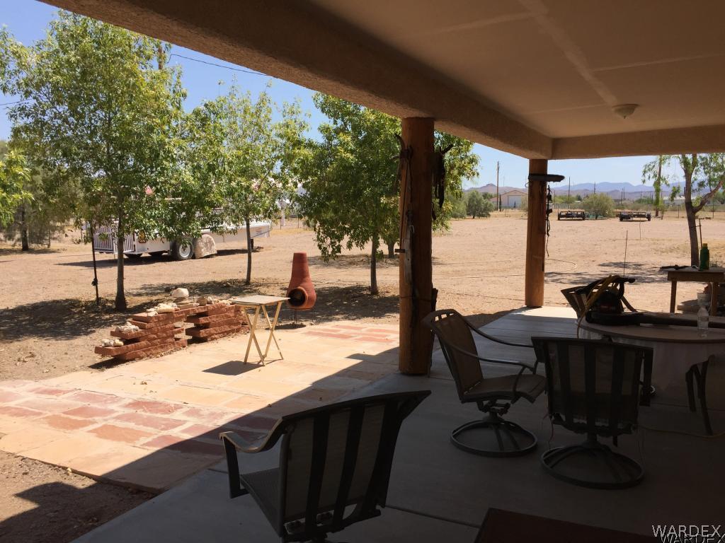 3133 West Carmichael Road Golden Valley, AZ 86413 - Photo 7 of 35 Backyard Porch