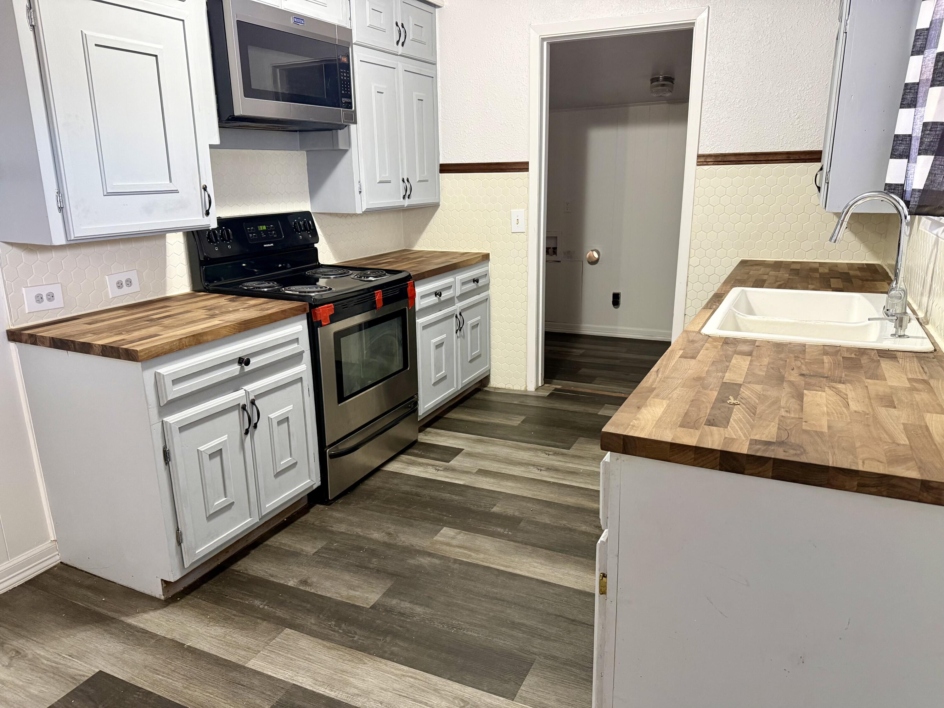 211 Watts Avenue Ralls, TX 79357 - Photo 4 of 16 IMG_3218