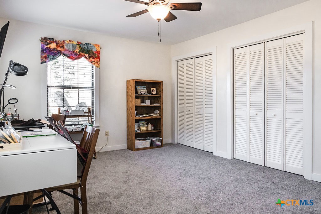 1439 Dagg Road Yoakum, TX 77995 - Photo 33 of 48 a view of a workspace with furniture and a window