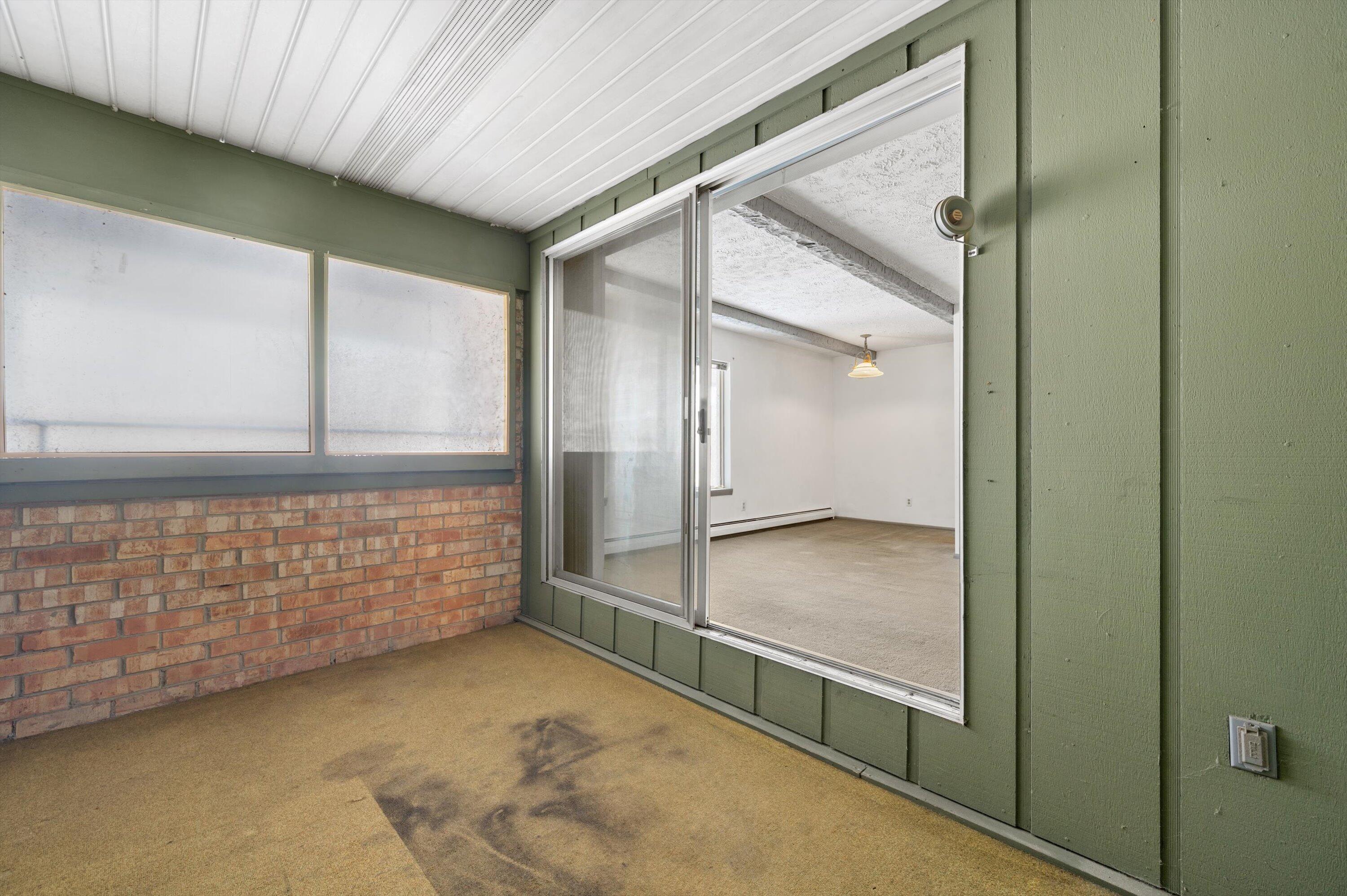 4000 West Rivers Edge Circle, Unit 24 Brown Deer, WI 53209 - Photo 16 of 17 Enclosed Porch