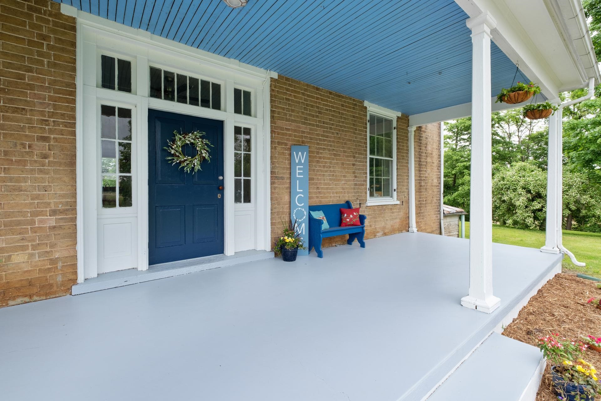 3 Rife's Ford Road Verona, VA 24482 - Photo 49 of 74 a view of a patio with a table and chairs and floor to ceiling window