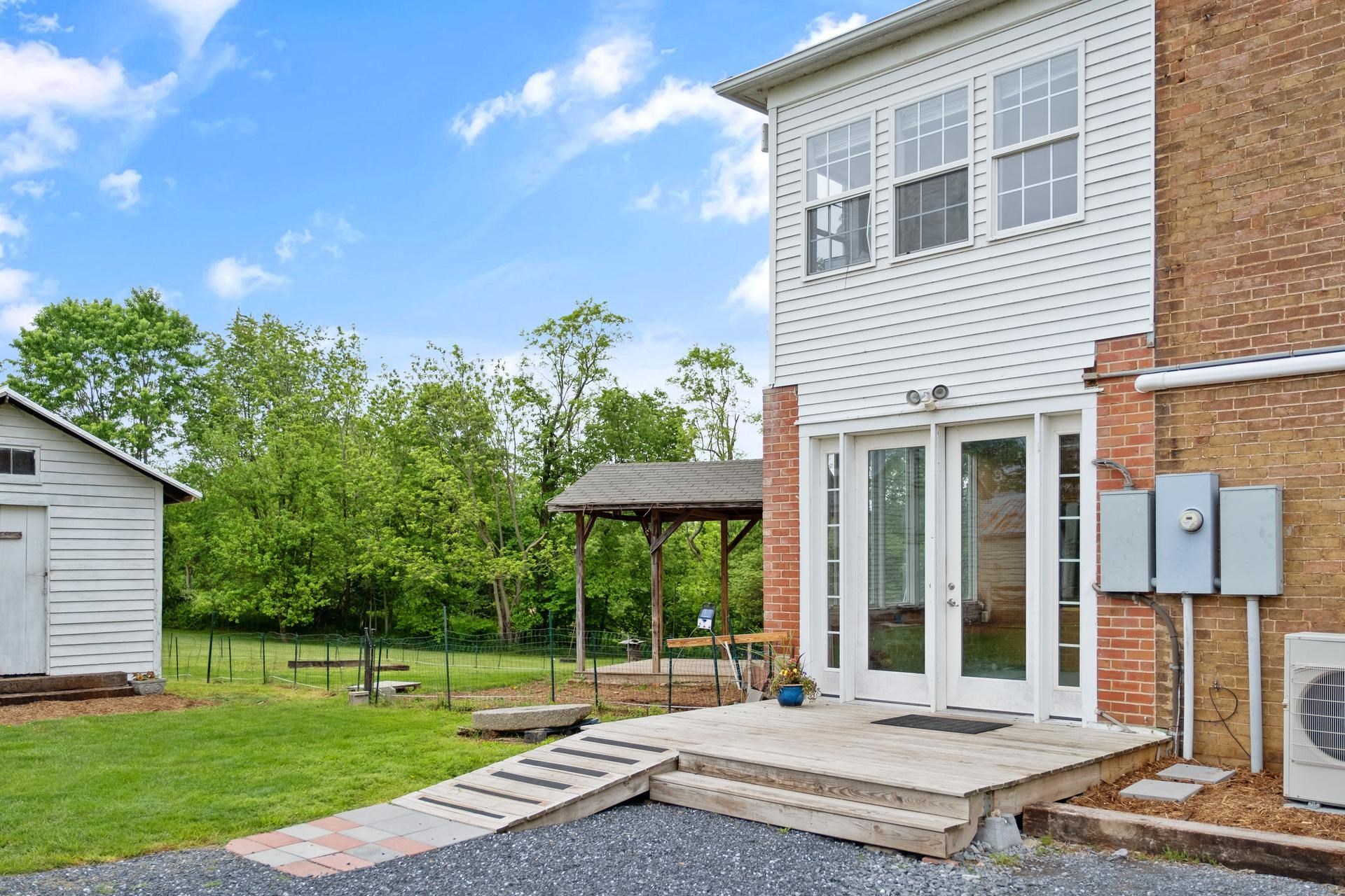3 Rife's Ford Road Verona, VA 24482 - Photo 65 of 74 a view of a backyard with a garden and plants