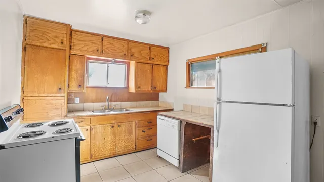 a utility room with washer and dryer
