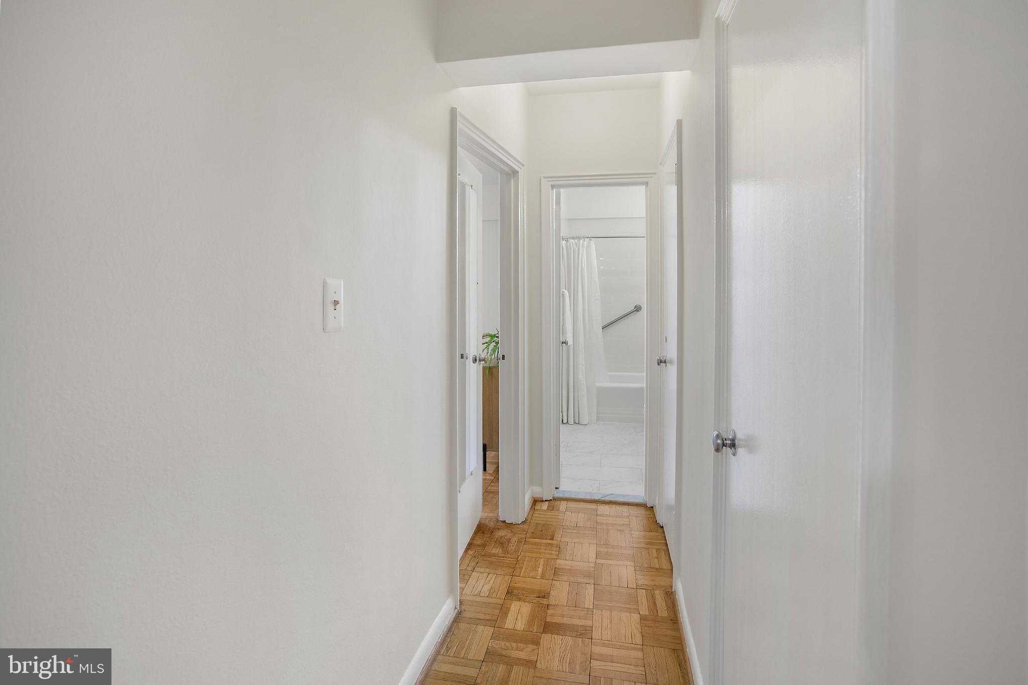 2500 Q Street Northwest, Unit 411 Washington, DC 20007 - Photo 8 of 24 Private Hallway to Bedroom w/ Two Hall Closets