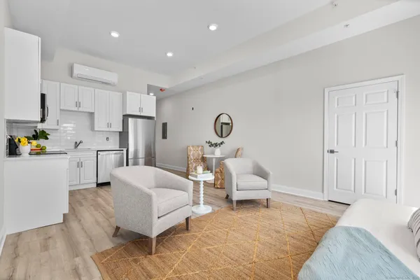 a living room with furniture and a couch