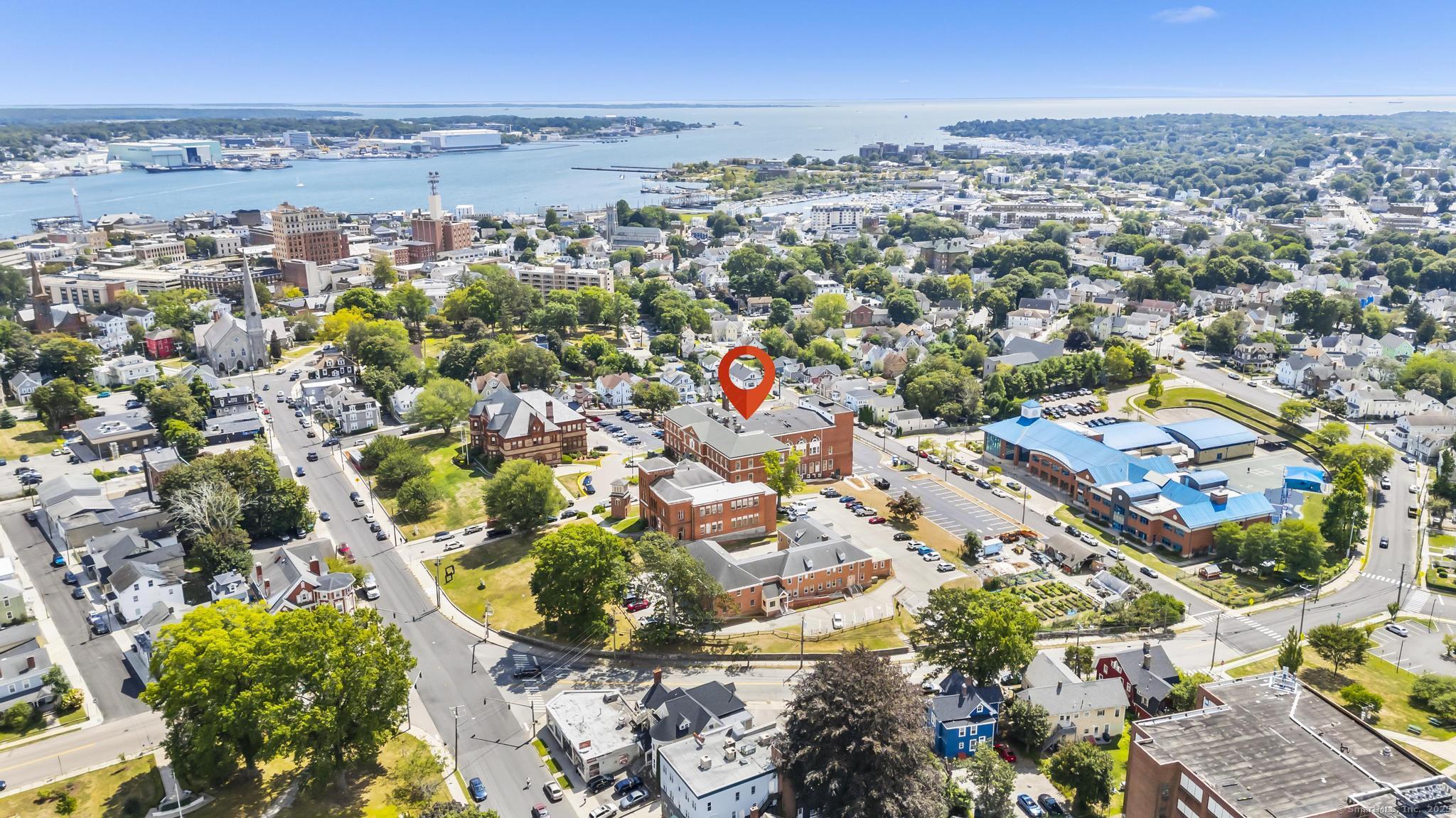 120 Broad Street, Unit 407 New London, CT 06320 - Photo 16 of 18 an aerial view of a city with lots of residential buildings