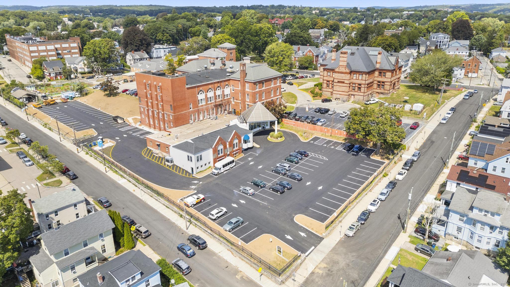 120 Broad Street, Unit 407 New London, CT 06320 - Photo 17 of 18 an aerial view of residential houses with outdoor space