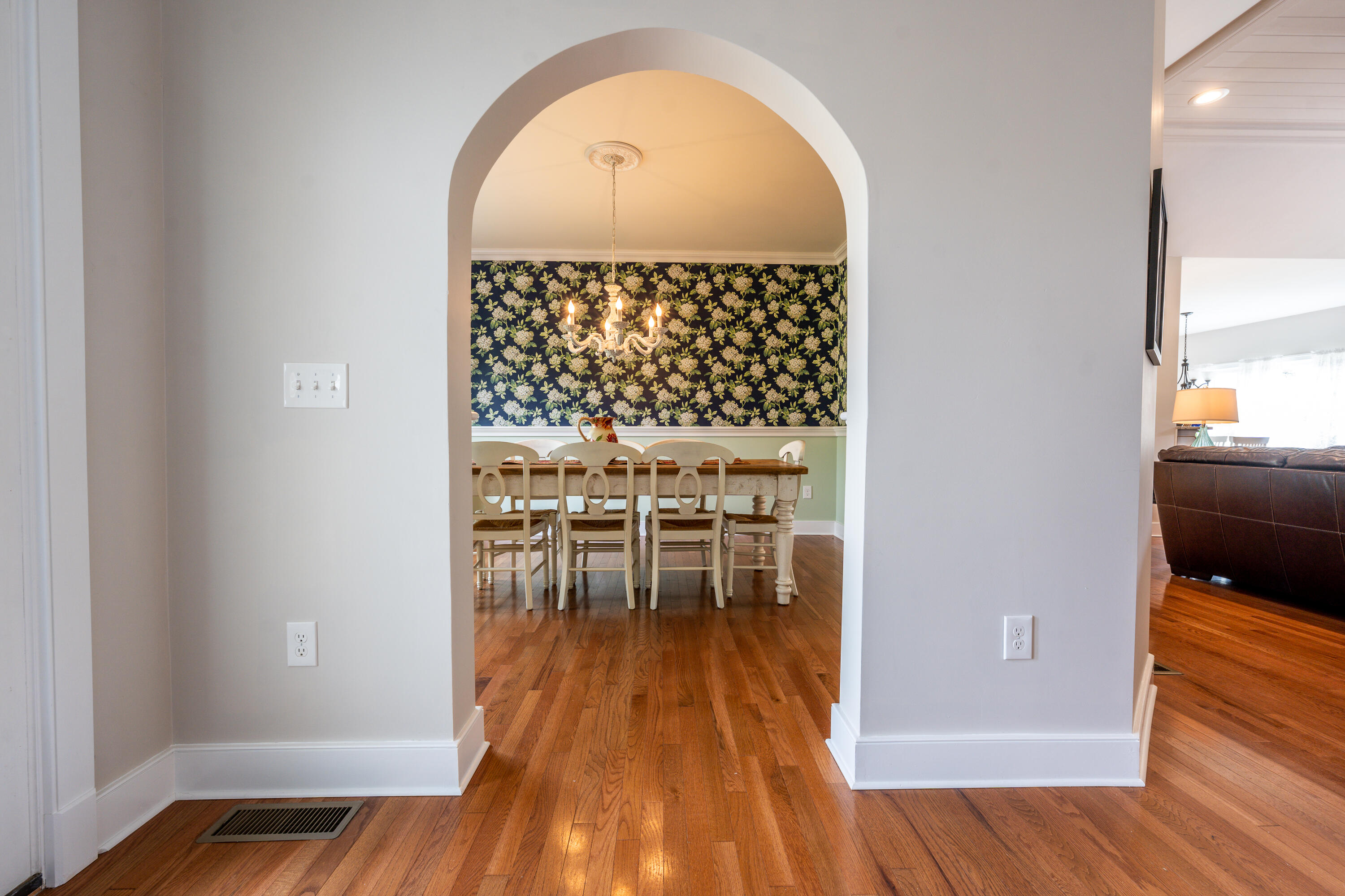 21 Jillian Drive Bourne, MA 02532 - Photo 15 of 46 wooden floor in a hall with a window
