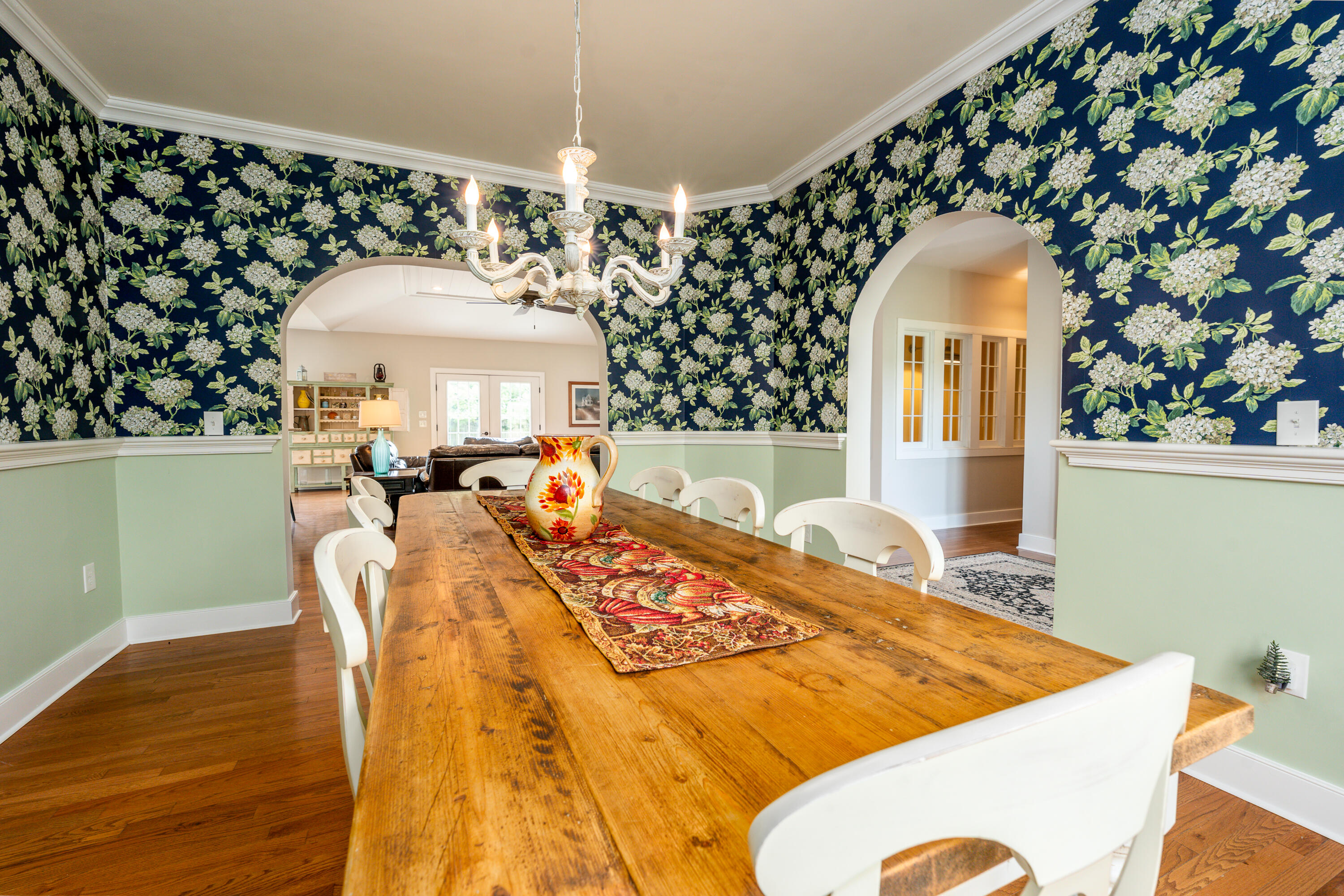 21 Jillian Drive Bourne, MA 02532 - Photo 16 of 46 a bed sitting in a bedroom next to a window with wooden floor