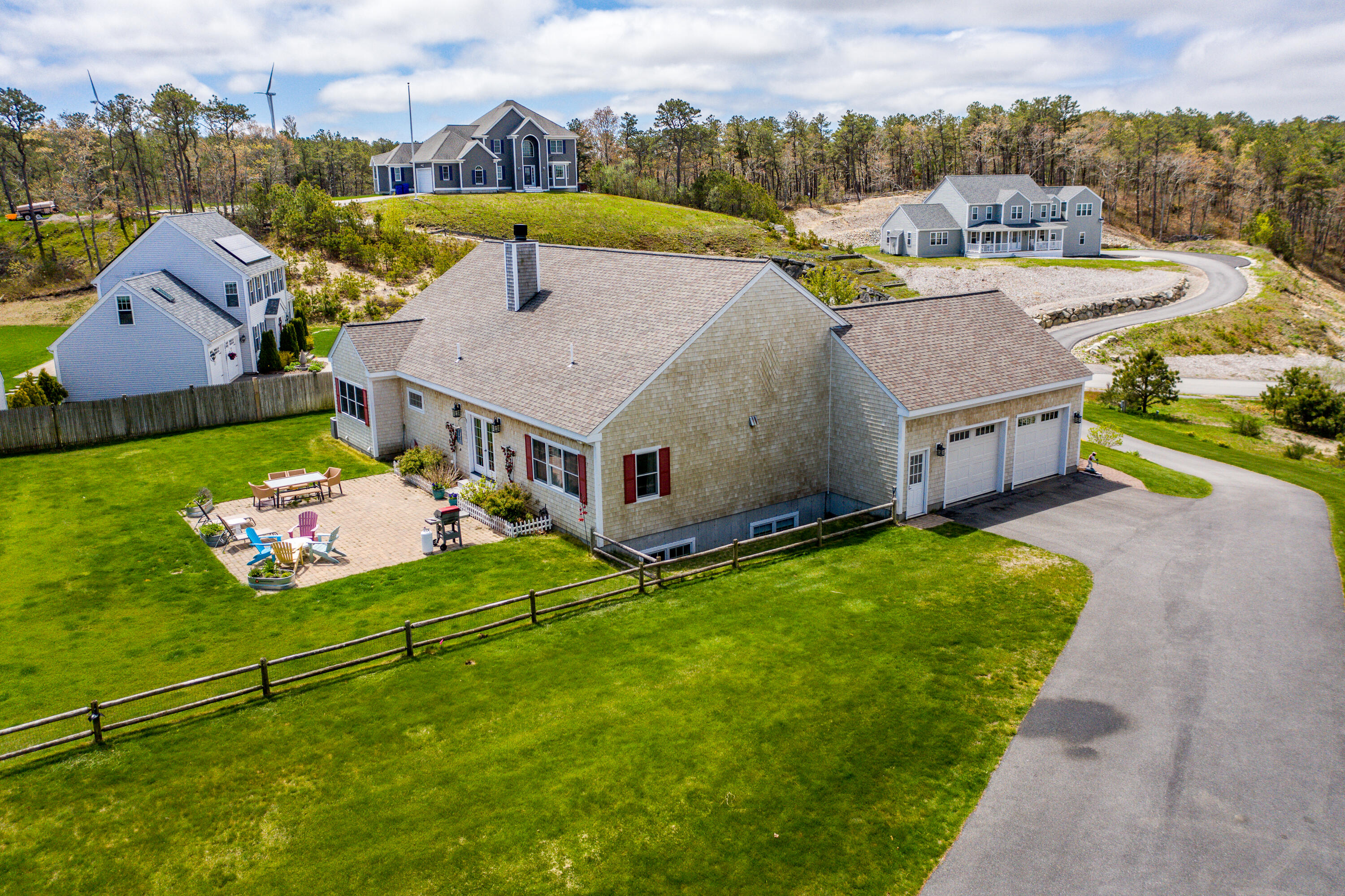 21 Jillian Drive Bourne, MA 02532 - Photo 2 of 46 an aerial view of a house with a garden