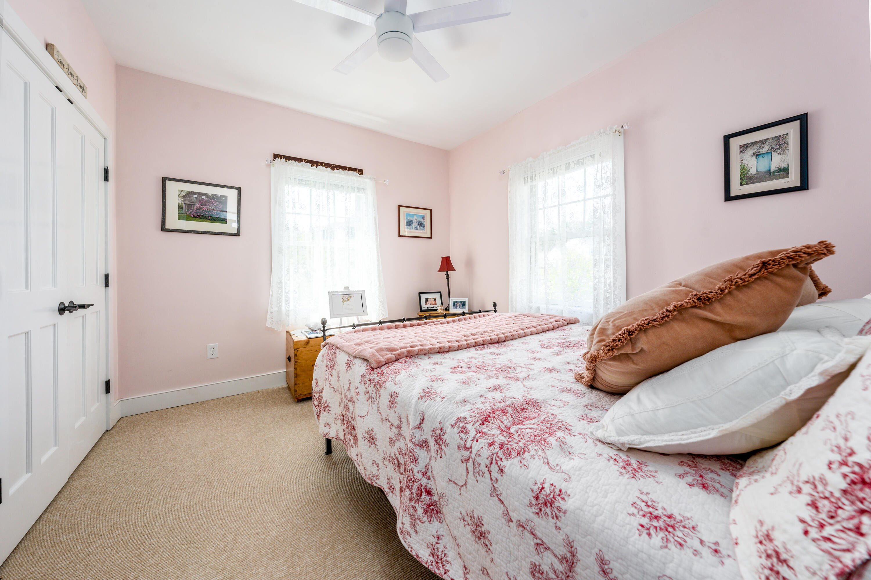 21 Jillian Drive Bourne, MA 02532 - Photo 23 of 46 a bedroom with a bed and a painting on the wall