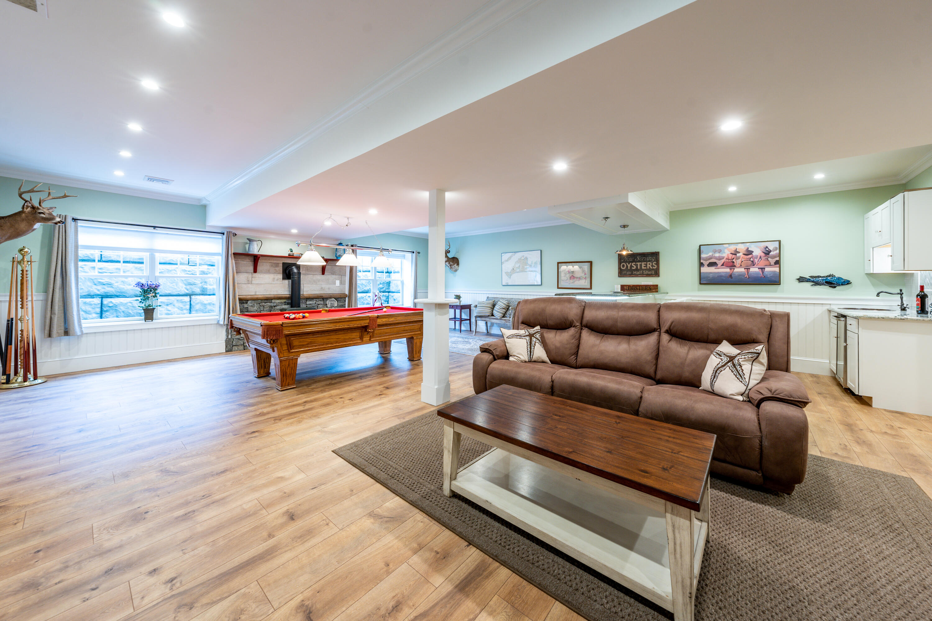 21 Jillian Drive Bourne, MA 02532 - Photo 30 of 46 a living room with furniture and a wooden floor