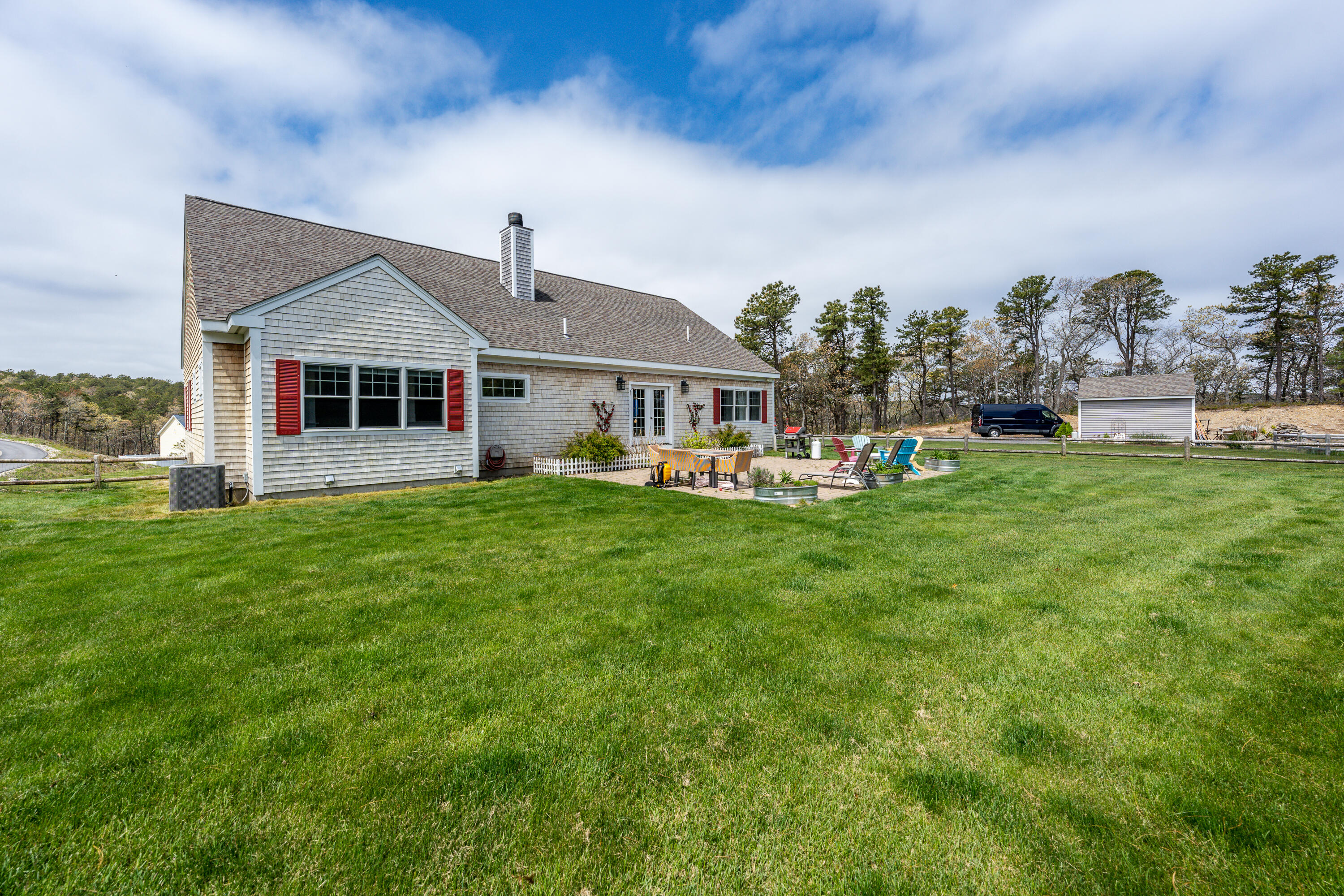 21 Jillian Drive Bourne, MA 02532 - Photo 42 of 46 a front view of house with yard and green space