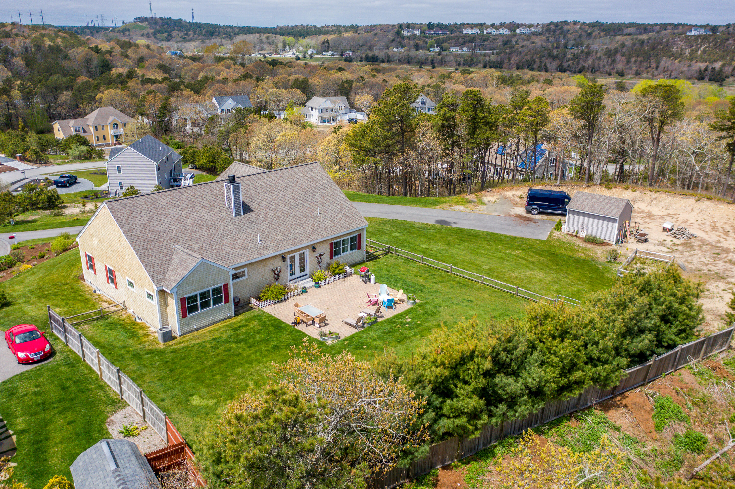 21 Jillian Drive Bourne, MA 02532 - Photo 45 of 46 an aerial view of a house with a garden and lake view