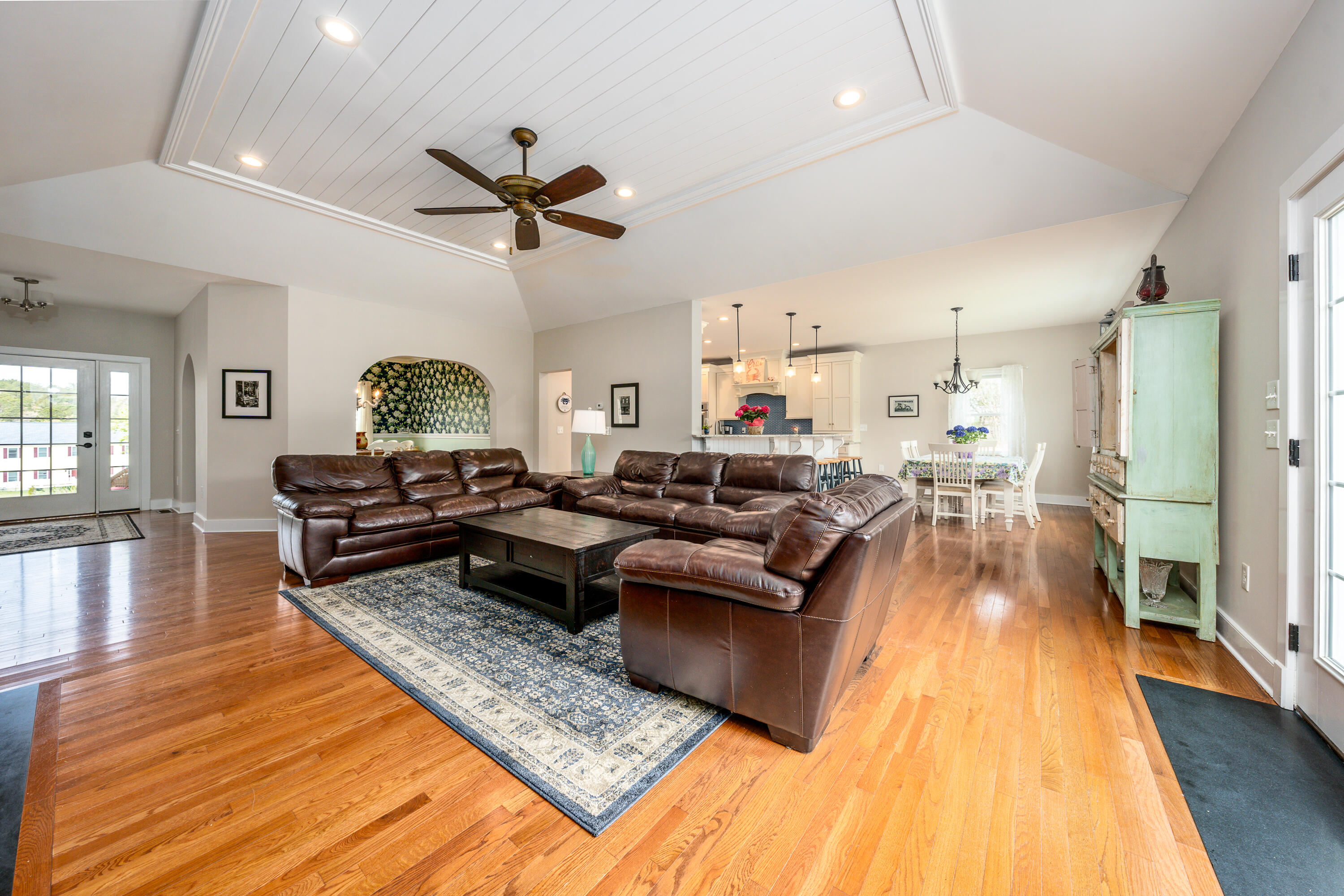 21 Jillian Drive Bourne, MA 02532 - Photo 6 of 46 a living room with lots of furniture and a rug