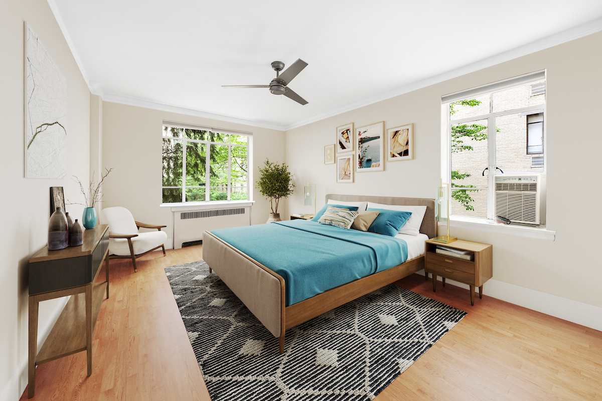 250 West 24th Street, Unit 1CW Manhattan, NY 10011 - Photo 2 of 12 a bedroom with a bed couch and a window