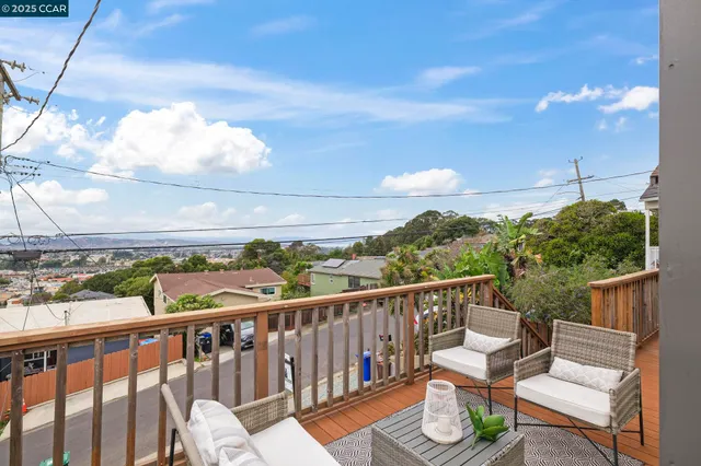 a view of a balcony with couches