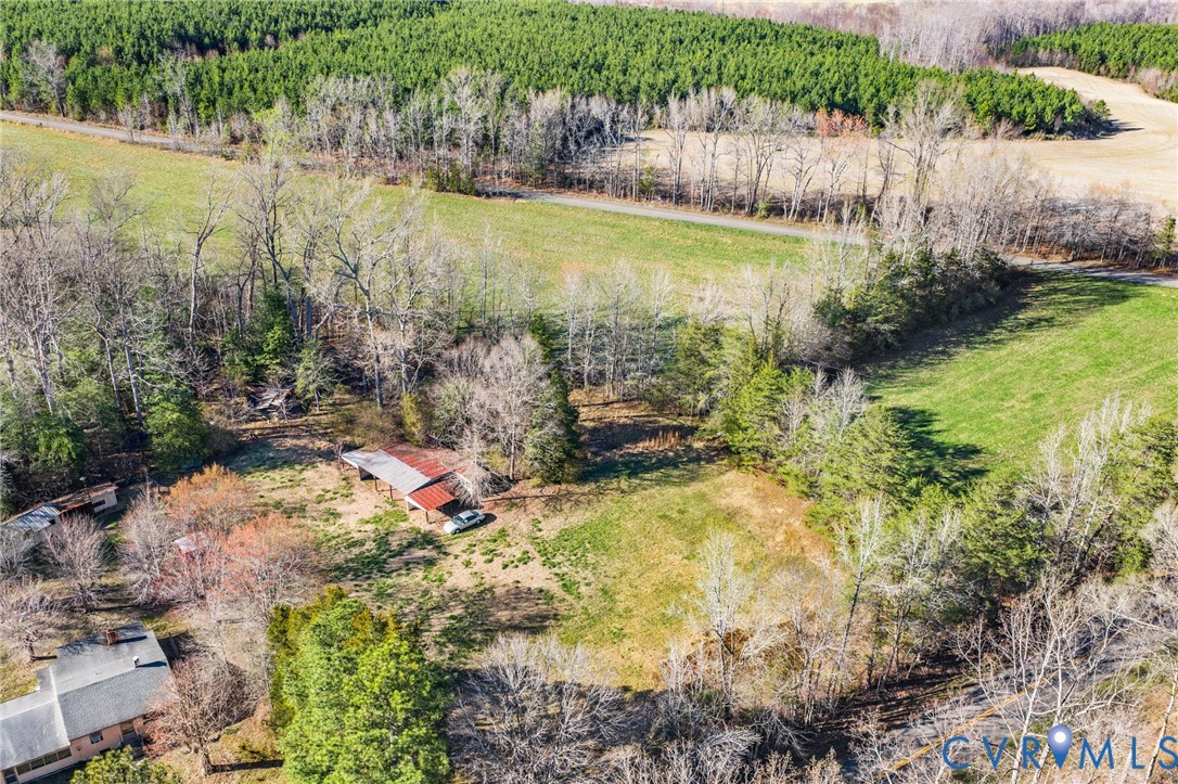19161 Hollowing Creek Road Beaverdam, VA 23015 - Photo 8 of 27 a backyard of a house with a yard and lake view
