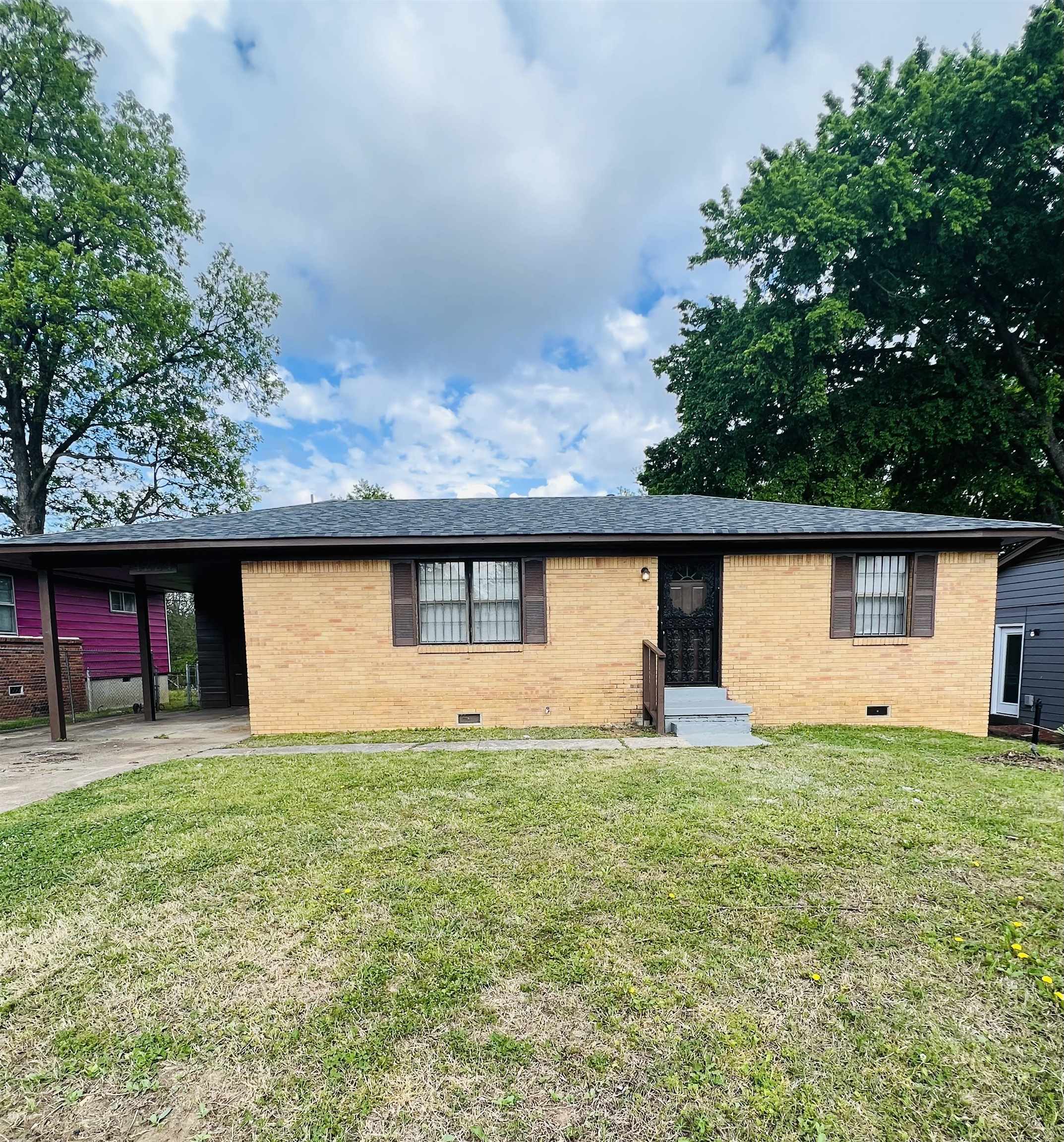 4224 Arrow Road Memphis, TN 38109 - Photo 1 of 11 a house with trees in the background