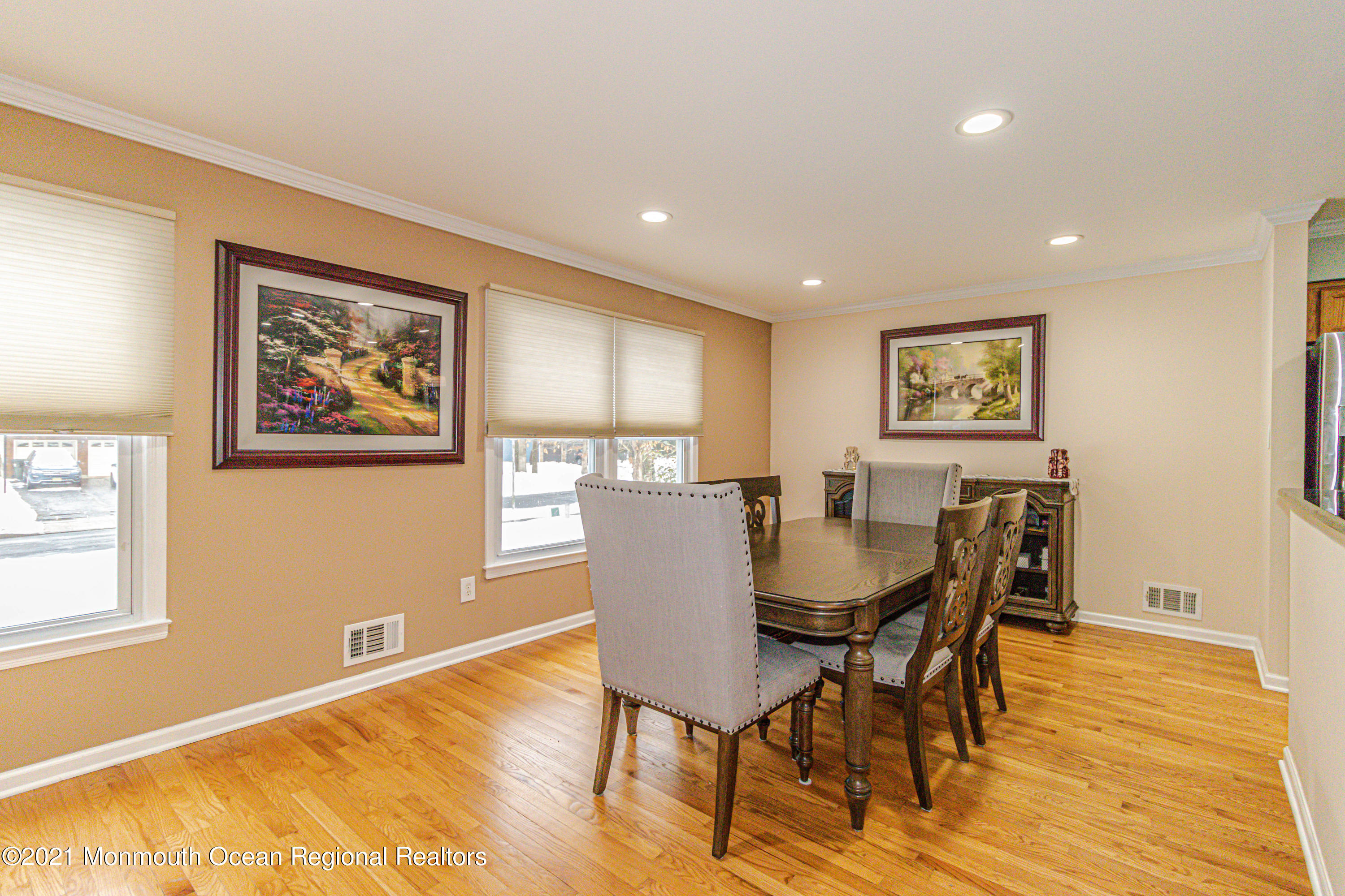 30 Eaglenest Road Freehold, NJ 07728 - Photo 11 of 39 a view of a dining room with furniture and wooden floor