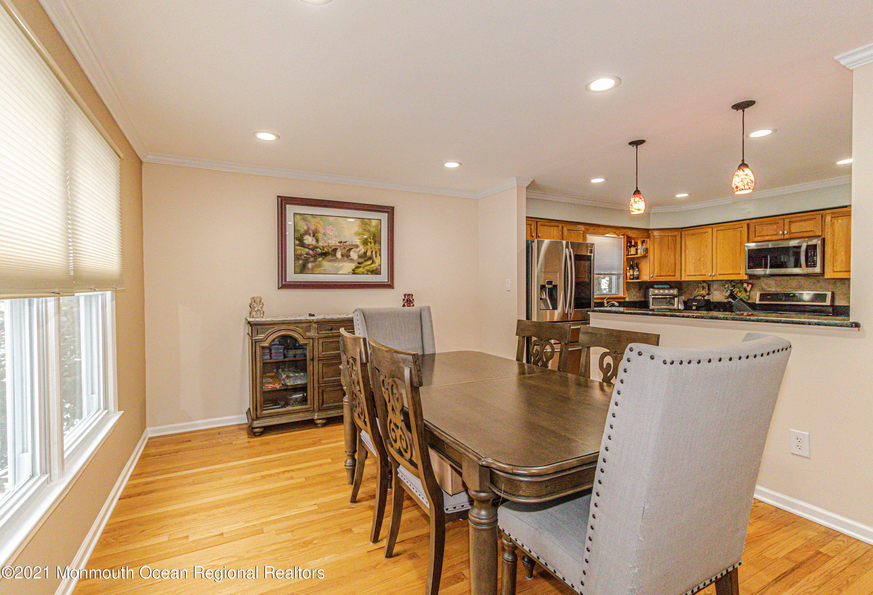 30 Eaglenest Road Freehold, NJ 07728 - Photo 12 of 39 a dining room with furniture and wooden floor
