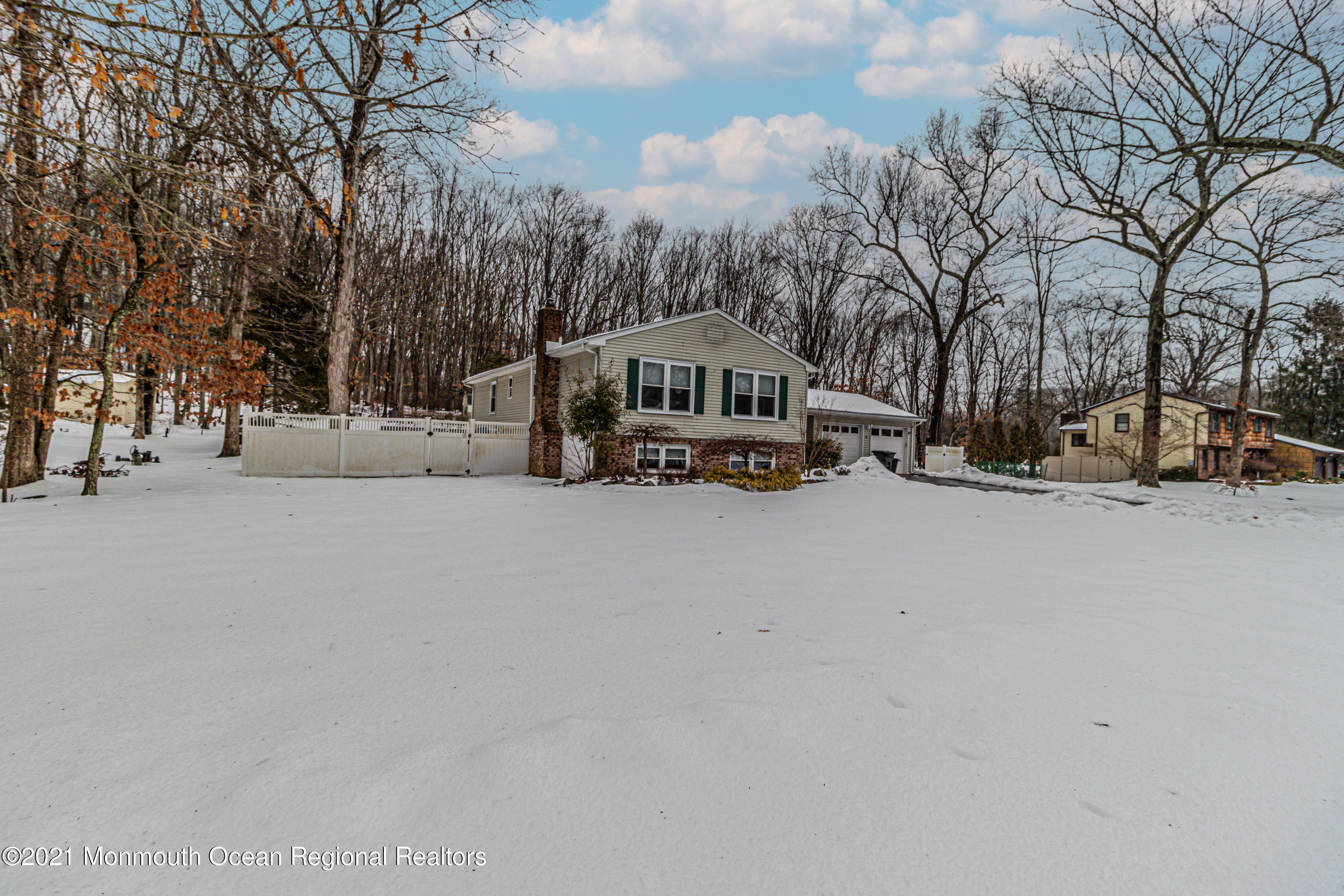 30 Eaglenest Road Freehold, NJ 07728 - Photo 3 of 39 a car parked in front of the house
