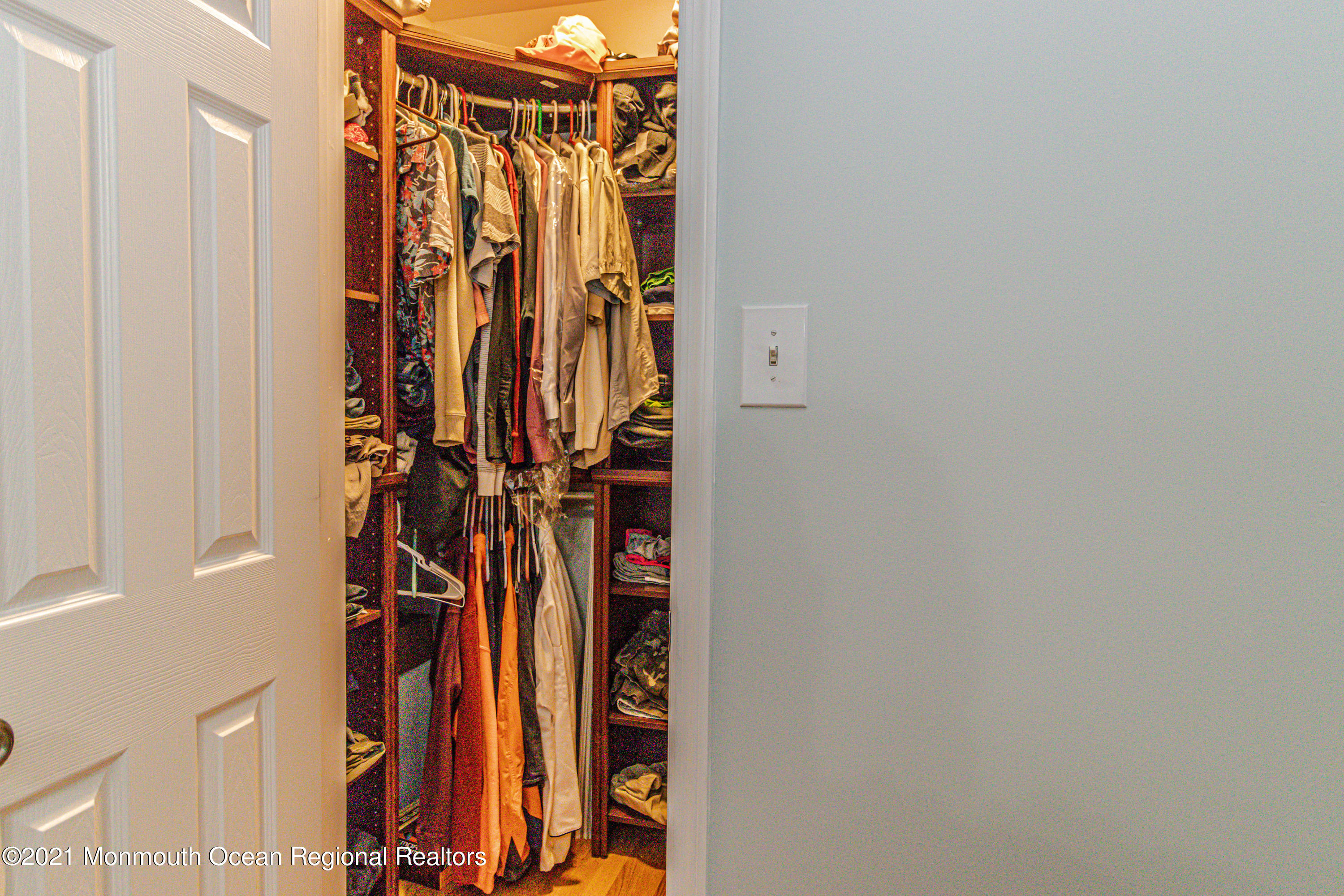 30 Eaglenest Road Freehold, NJ 07728 - Photo 21 of 39 a view of walk in closet with clothes