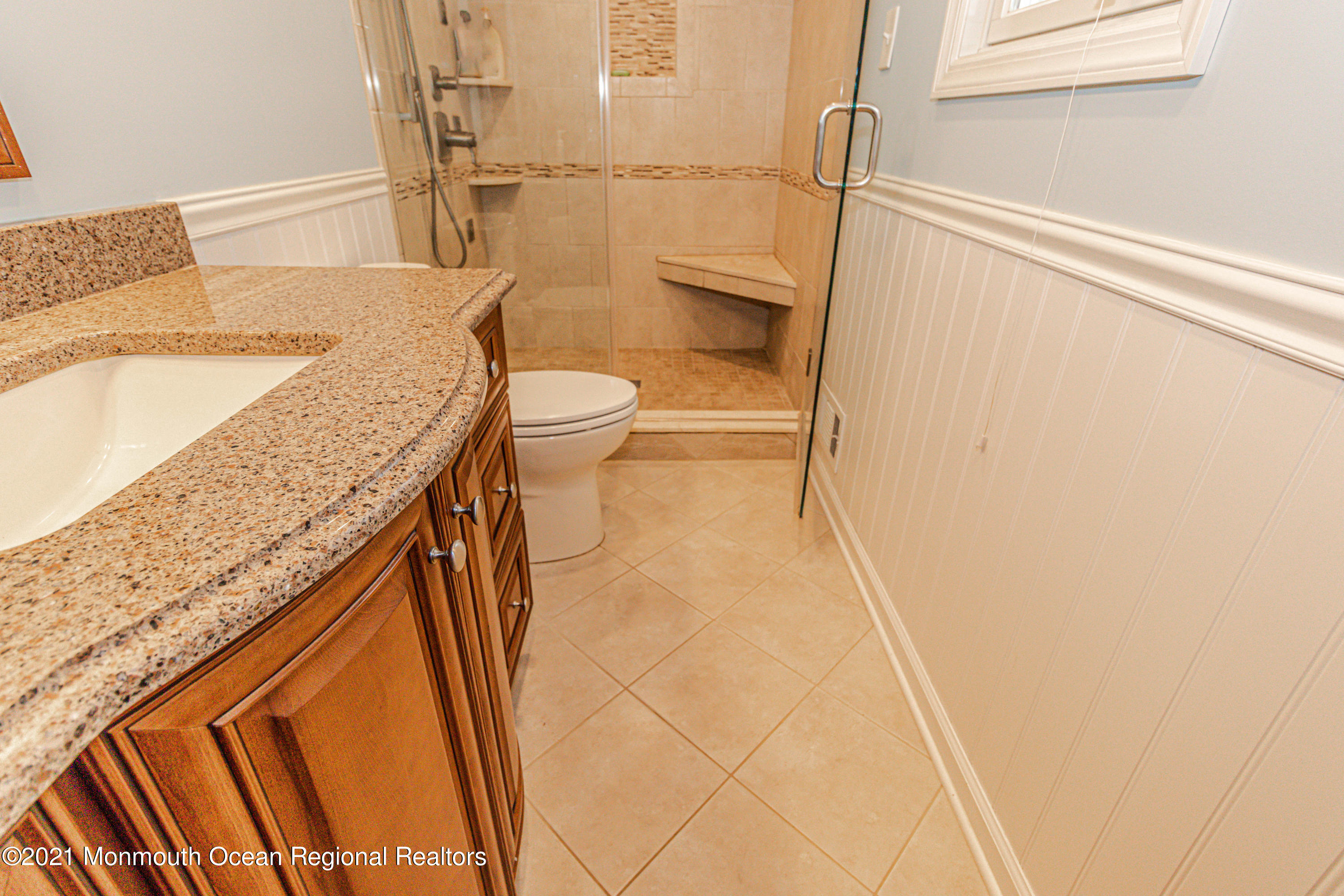 30 Eaglenest Road Freehold, NJ 07728 - Photo 23 of 39 a bathroom with a granite countertop sink and toilet