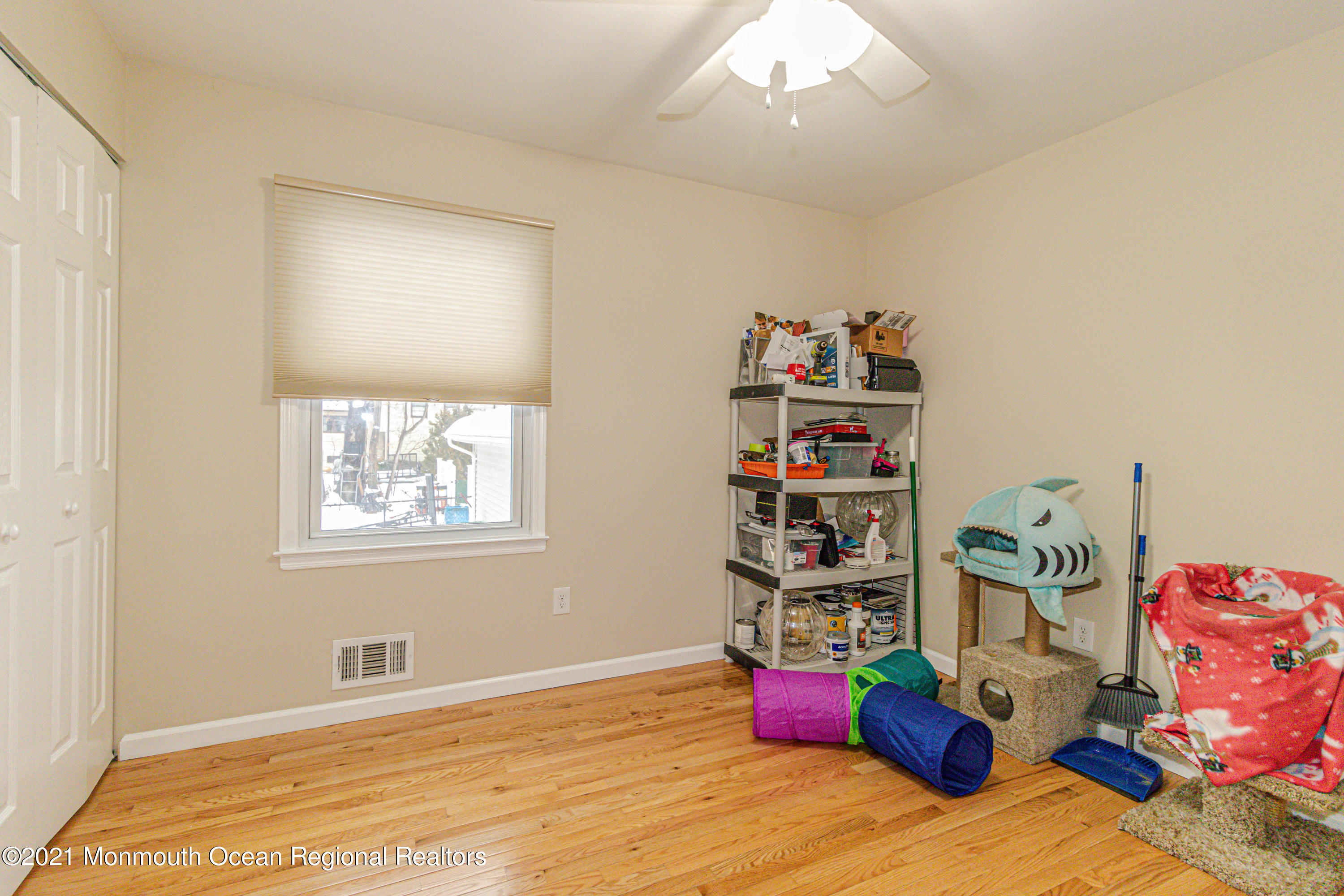 30 Eaglenest Road Freehold, NJ 07728 - Photo 25 of 39 a bedroom with furniture and natural light