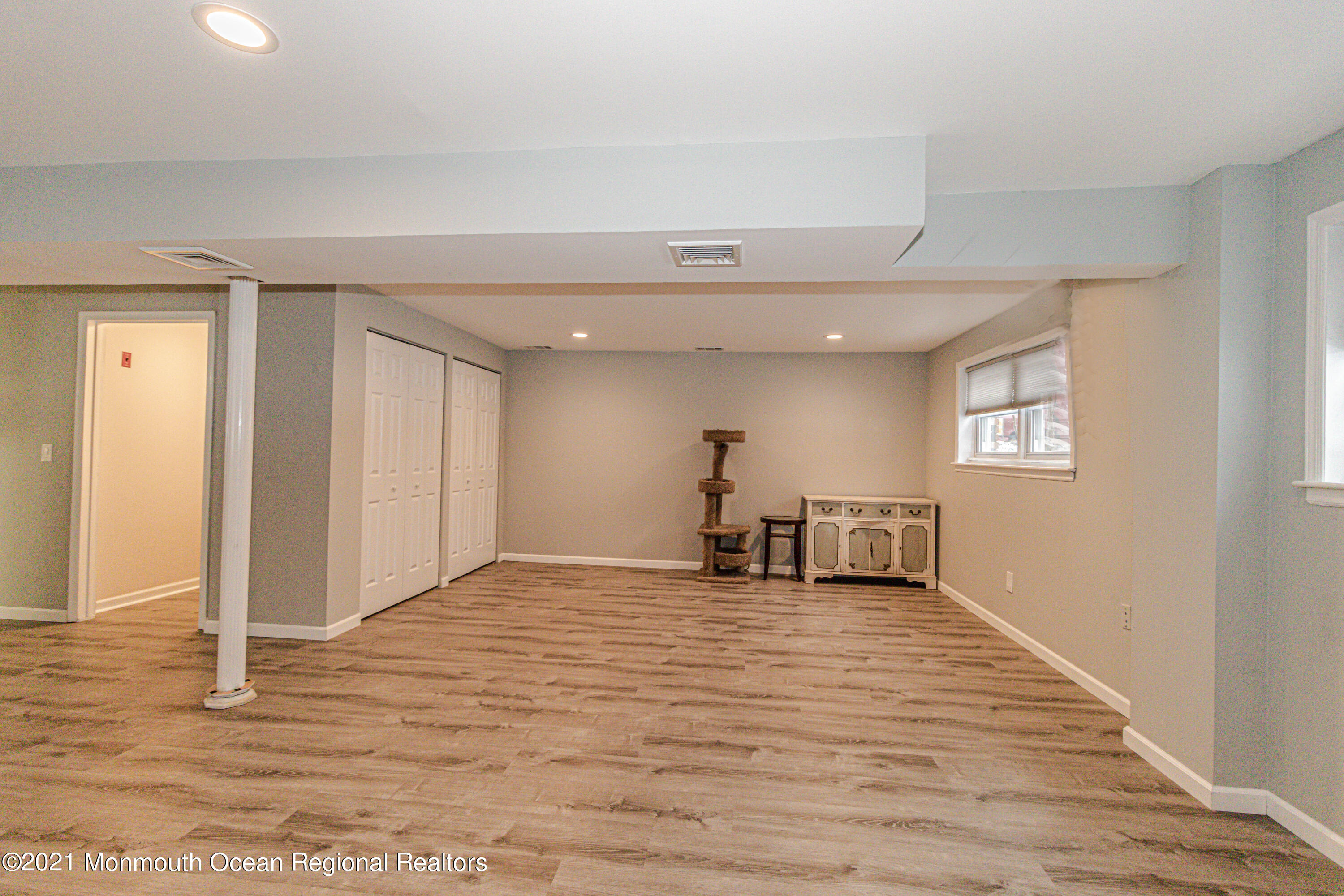 30 Eaglenest Road Freehold, NJ 07728 - Photo 27 of 39 a view of a livingroom with a workspace