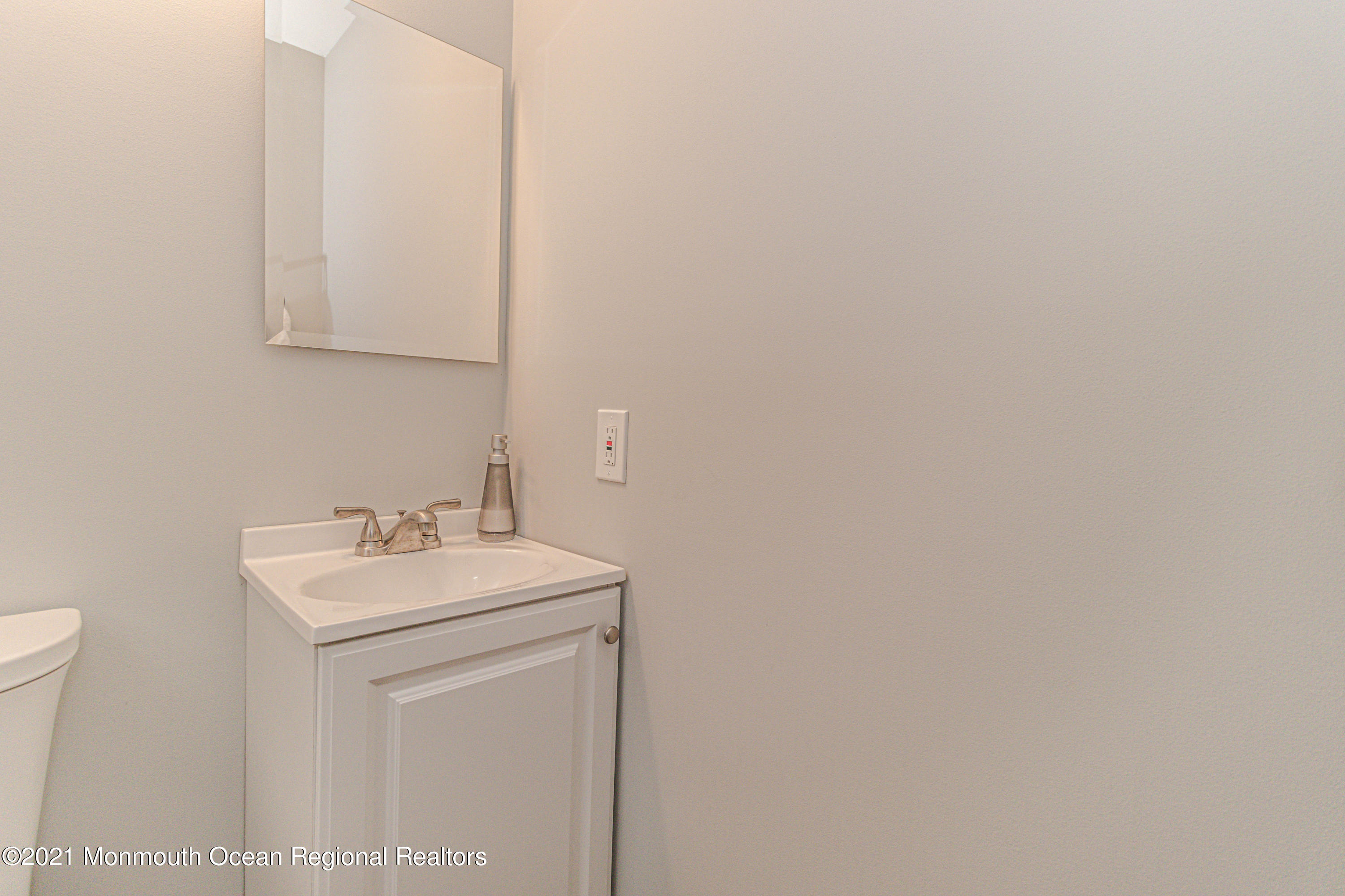 30 Eaglenest Road Freehold, NJ 07728 - Photo 30 of 39 a bathroom with a sink and a toilet