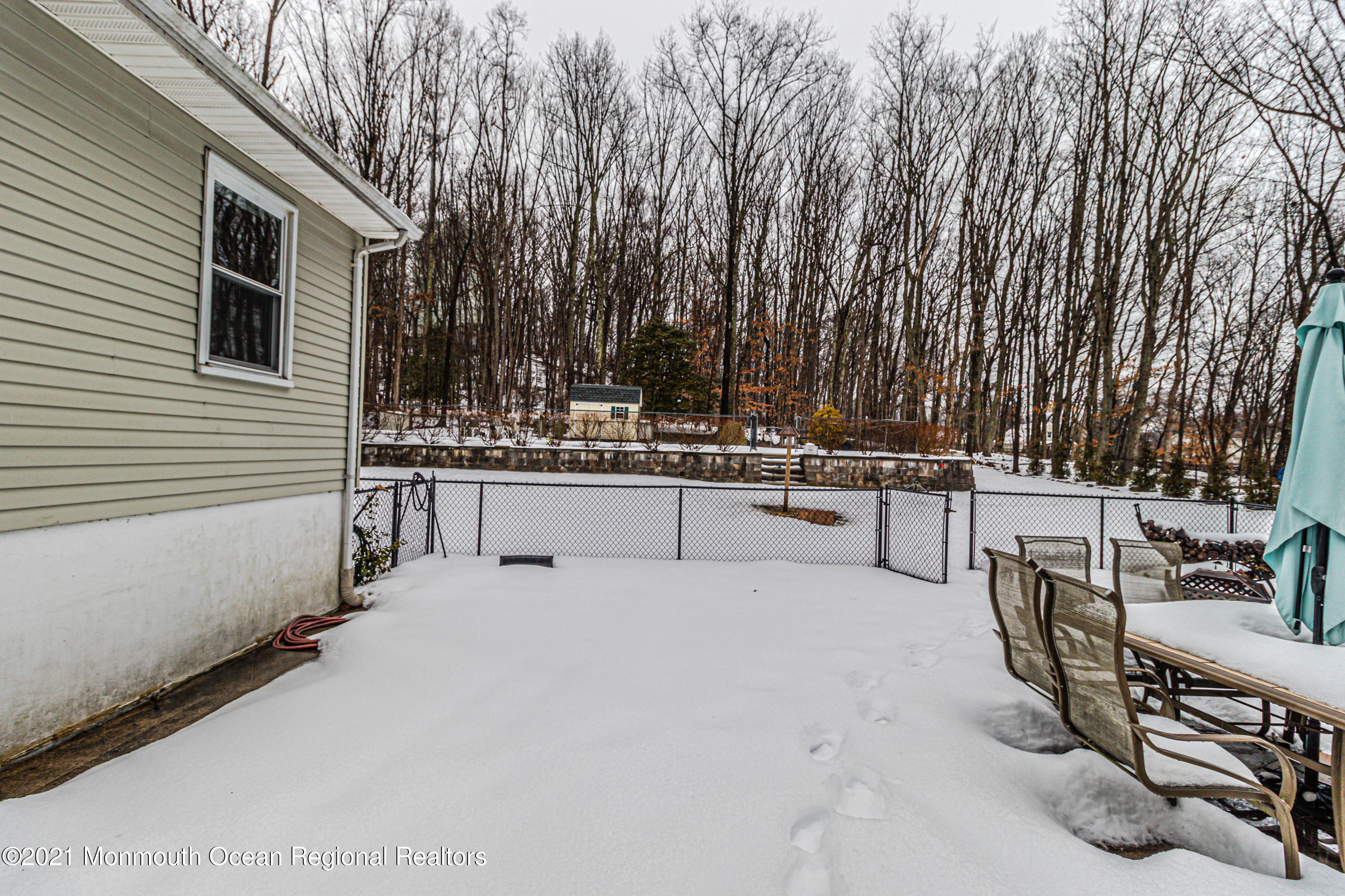 30 Eaglenest Road Freehold, NJ 07728 - Photo 34 of 39 a view of a patio with swimming pool