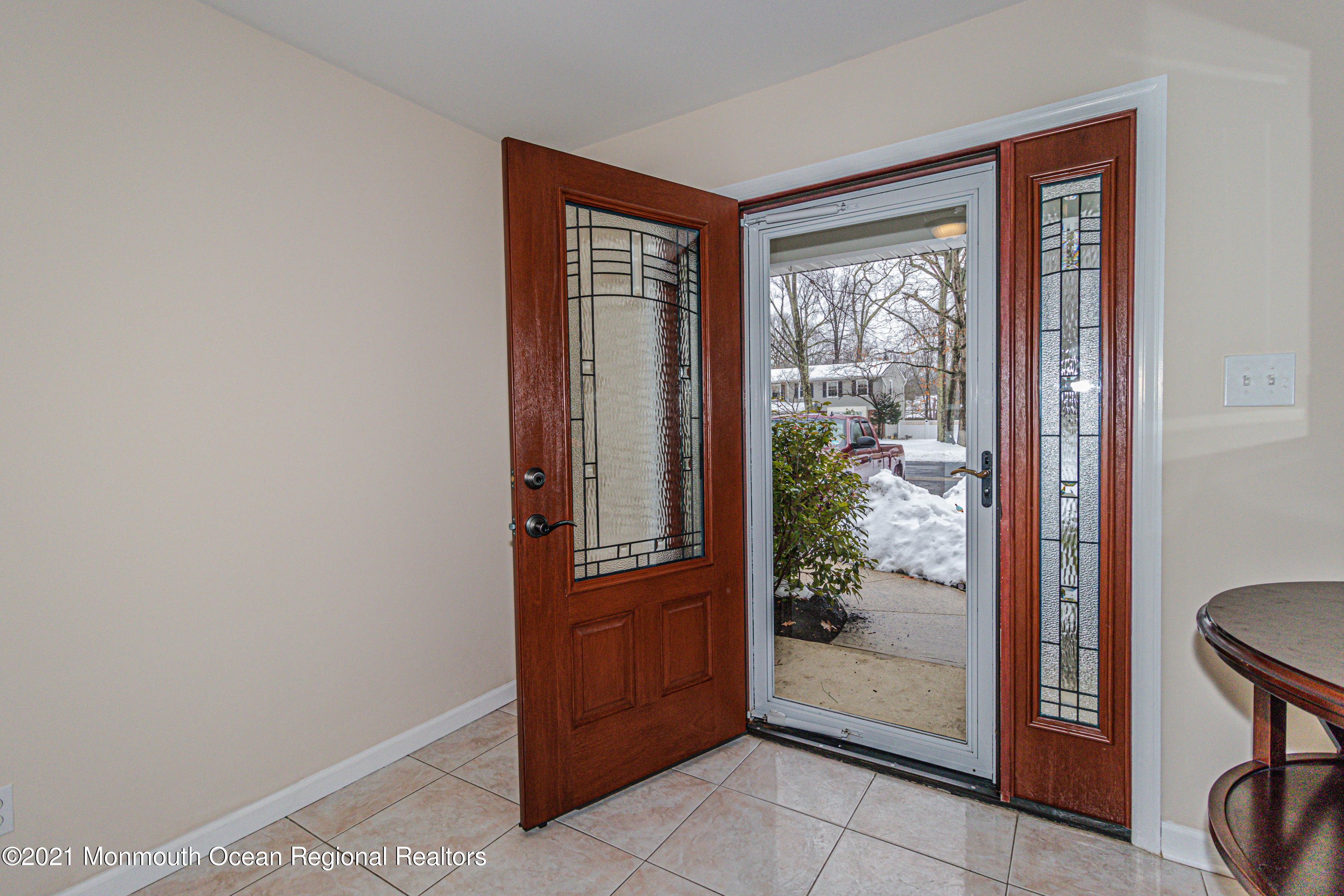 30 Eaglenest Road Freehold, NJ 07728 - Photo 5 of 39 a view of a hallway with furniture and front door