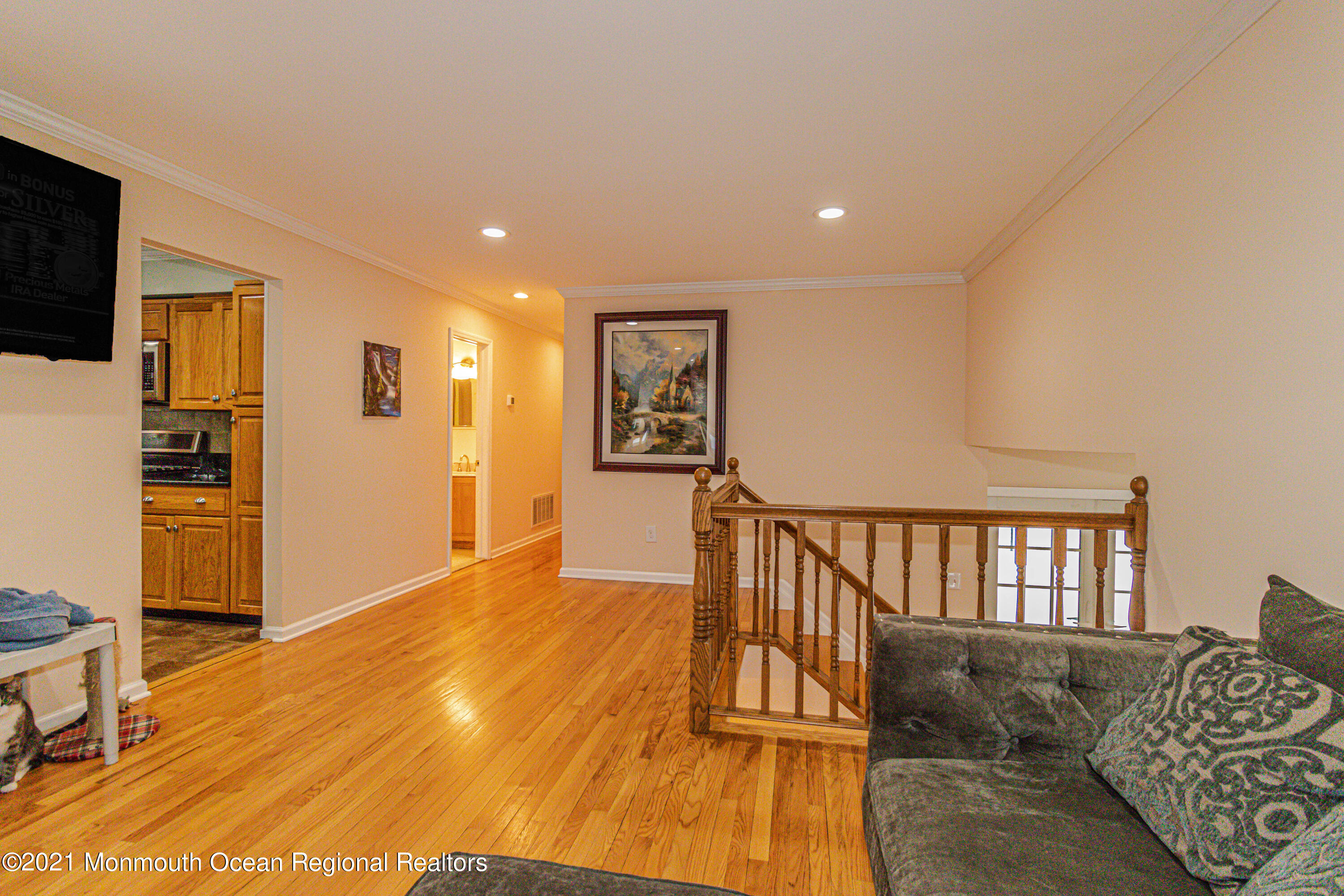 30 Eaglenest Road Freehold, NJ 07728 - Photo 10 of 39 a living room with furniture and a flat screen tv