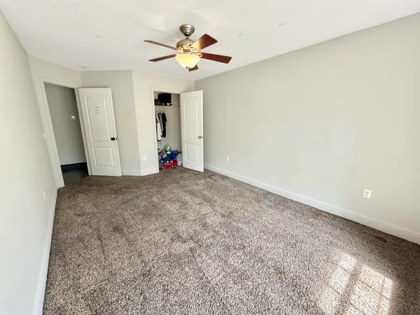 an empty room with a bathroom