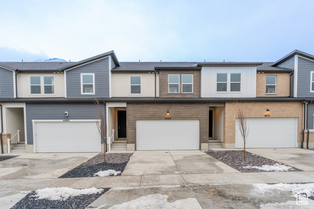4869 Olive Avenue, Unit 138 Mapleton, UT 84664 - Photo 1 of 1 View of property featuring a garage