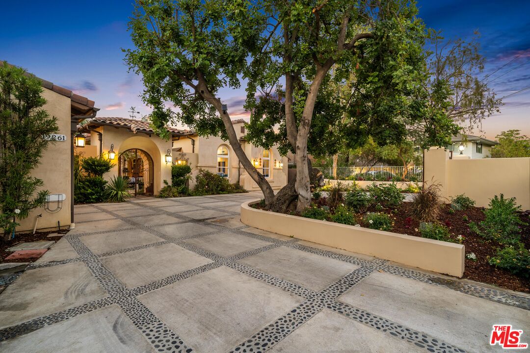 19261 Wells Drive Tarzana, CA 91356 - Photo 1 of 51 a view of a garden with potted plants