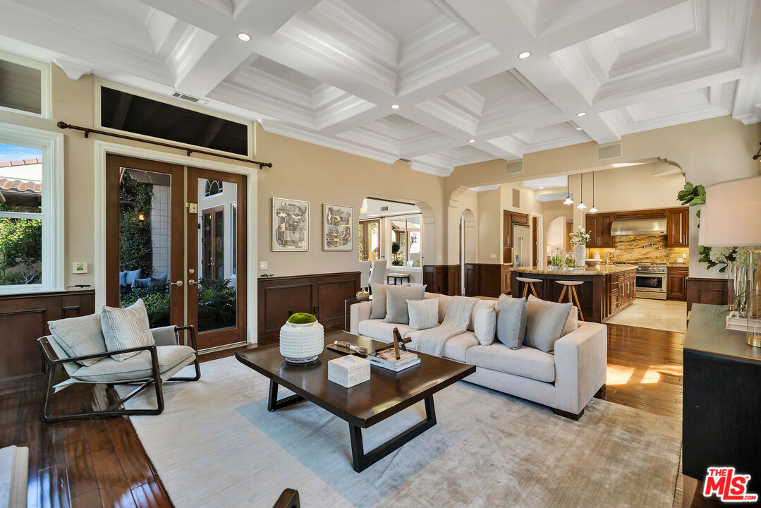 19261 Wells Drive Tarzana, CA 91356 - Photo 29 of 51 a living room with furniture and view of kitchen