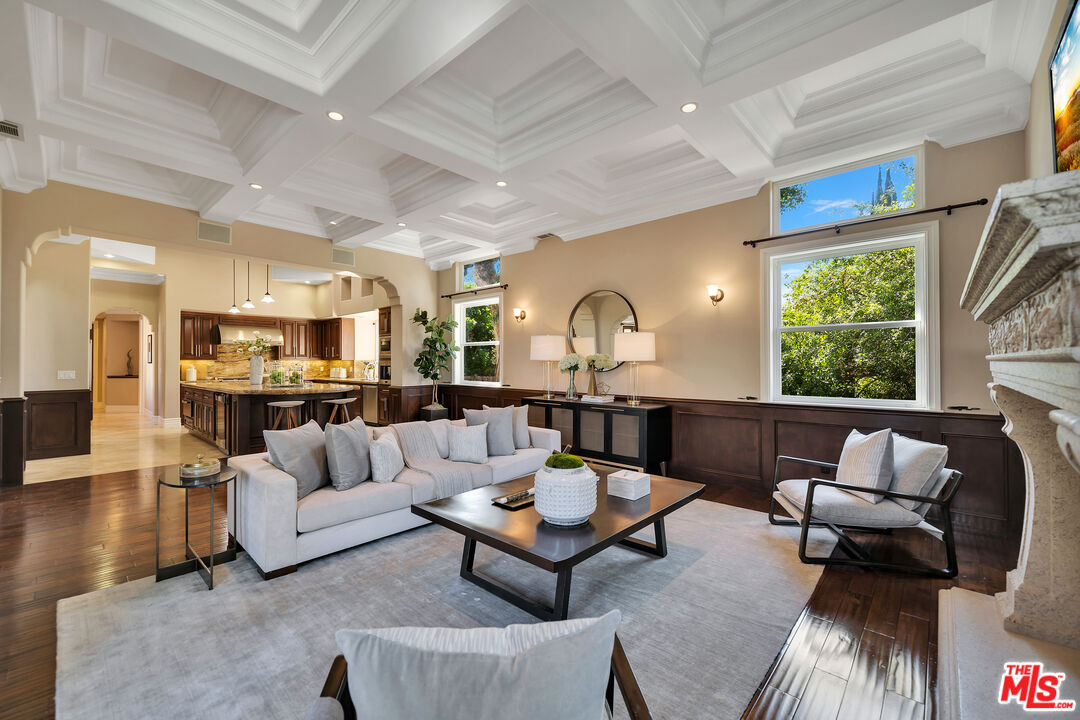 19261 Wells Drive Tarzana, CA 91356 - Photo 30 of 51 a living room with furniture and a large window